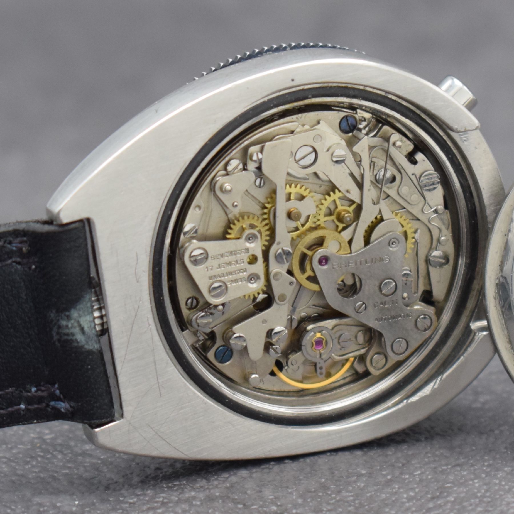 Detail h: BREITLING "Bull Head" Herrenarmbanduhr mit Chronograph Referenz 2117, Schweiz um 1975, Automatik, pultförmiges Edelstahlgeh. inkl. ...