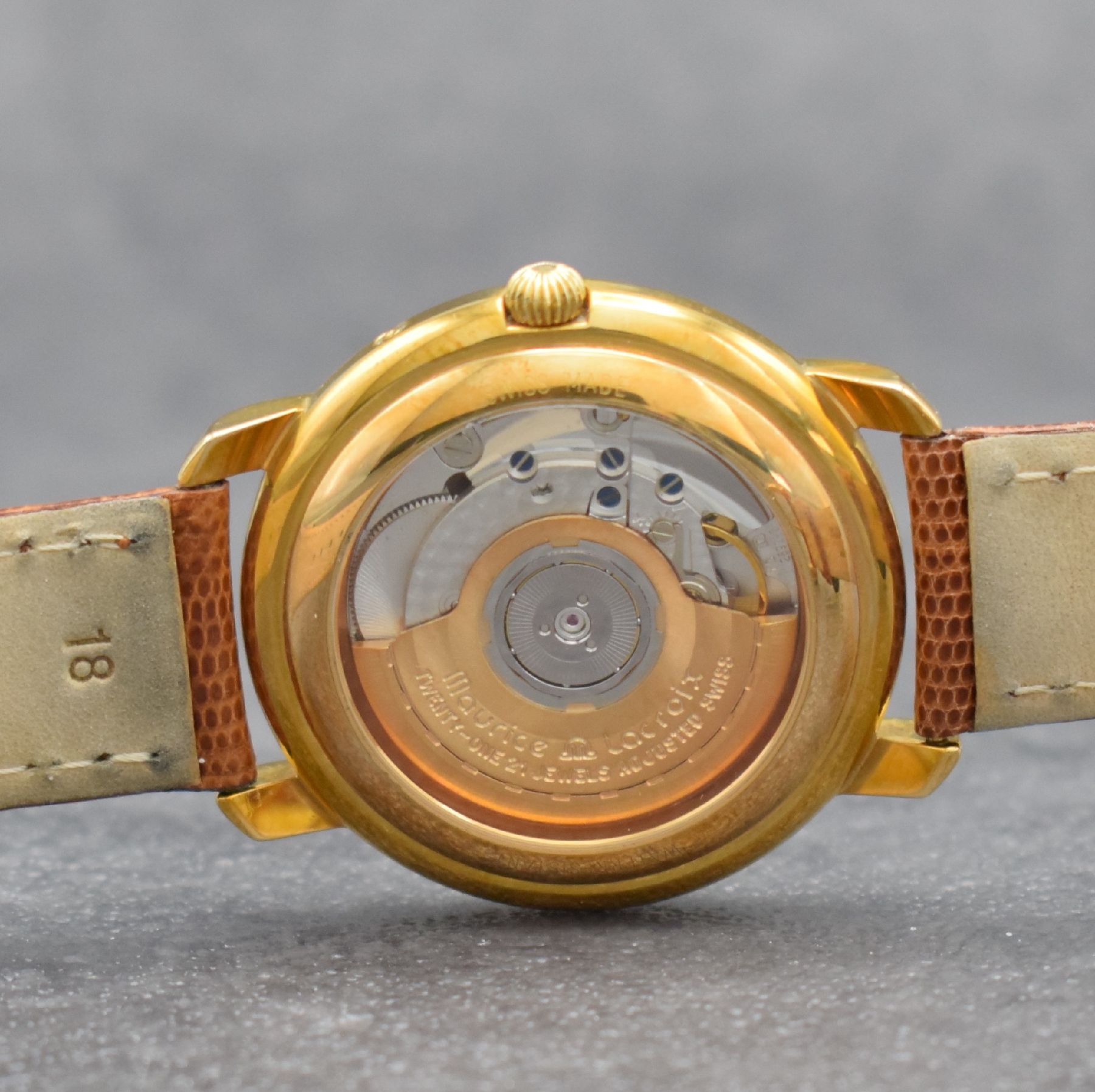 Detail e: MAURICE LACROIX Regulateur Herrenarmbanduhr, Schweiz verk. lt. beil. Pap. 08/1996, Automatik, Ref. 3765, verg. Geh. beids. vergl., Boden & Glasrand ...