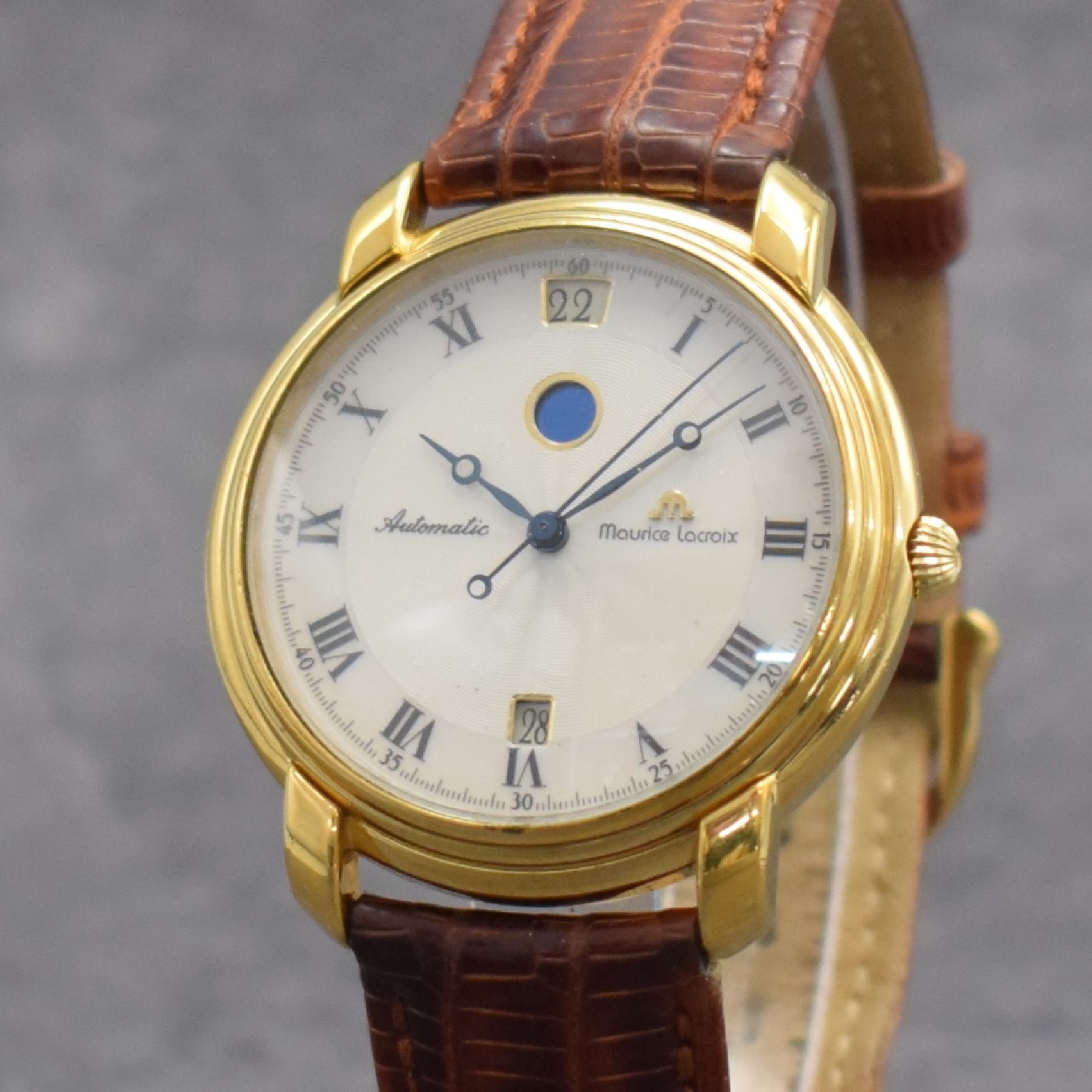 Detail d: MAURICE LACROIX Herrenarmbanduhr Modell Les Mécaniques, Schweiz um 2000, Ref. 29399, verg. Geh. beids. vergl., Boden & Glasrand aufgedr., Maurice ...