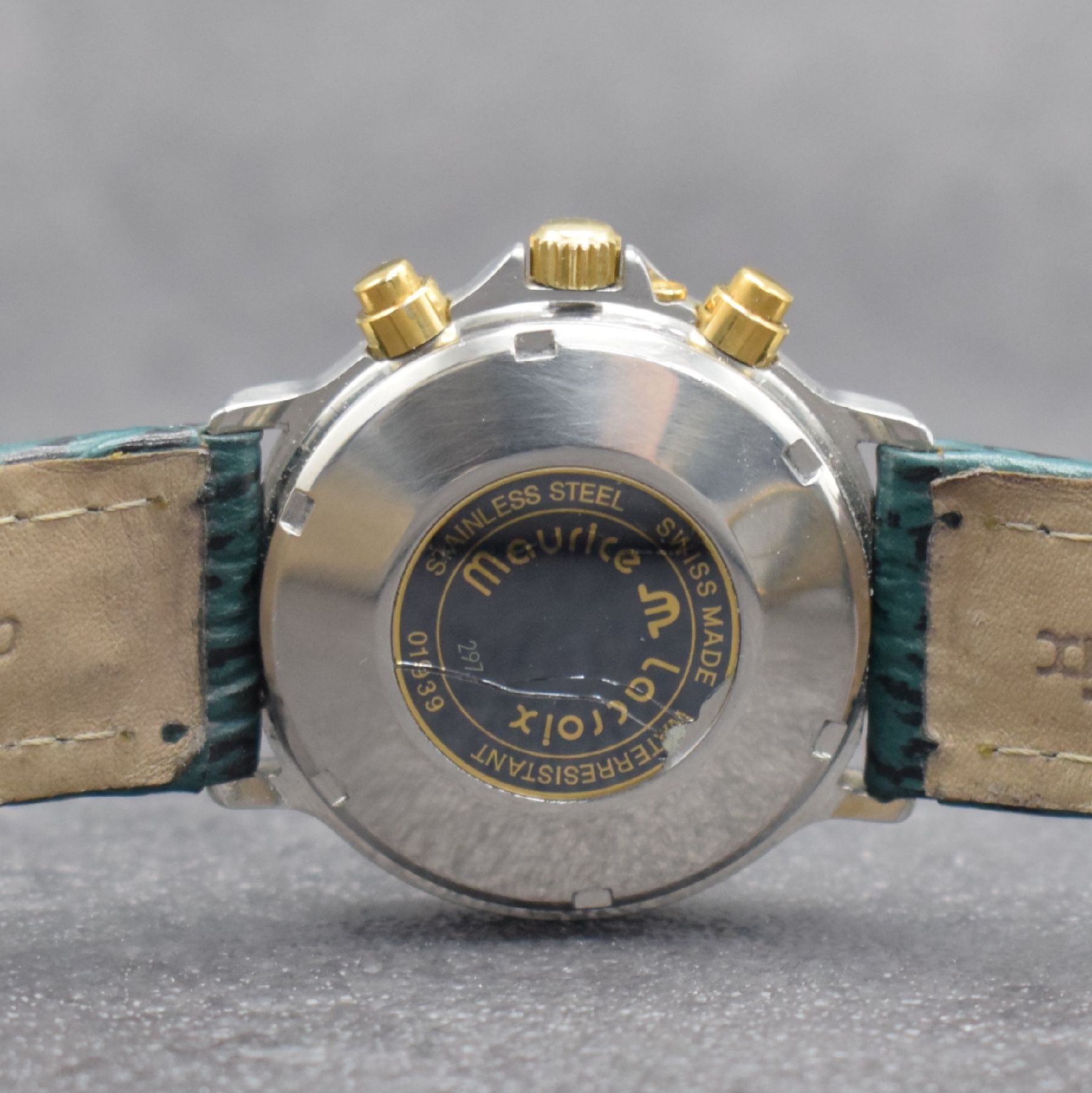 Detail d: MAURICE LACROIX Herrenarmbanduhr mit Chronograph & Mondphase, Schweiz um 1990, Automatik, Ref. 01939, Stahl/Gold komb., verschr. Boden (besch.) & ...