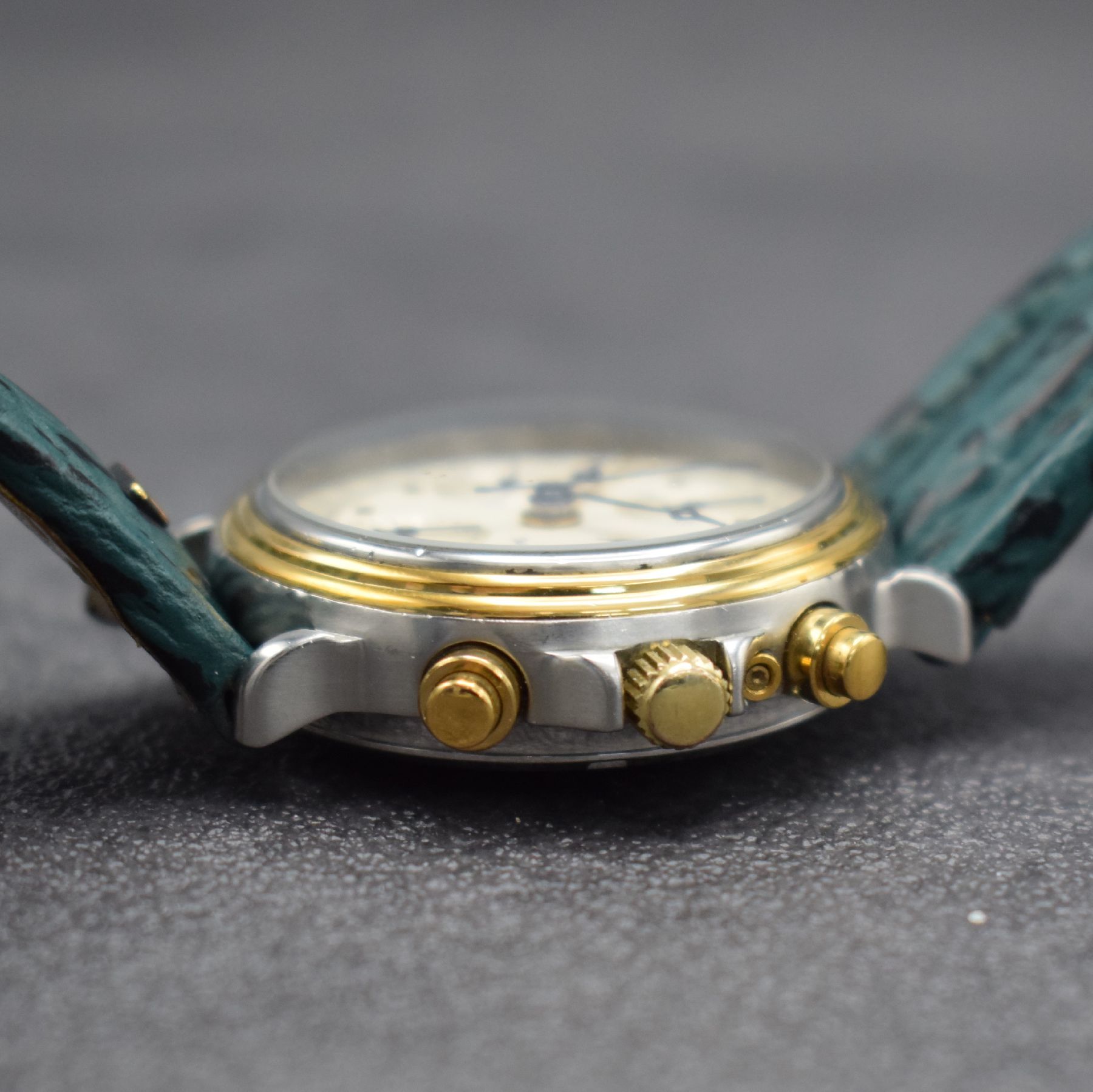 Detail e: MAURICE LACROIX Herrenarmbanduhr mit Chronograph & Mondphase, Schweiz um 1990, Automatik, Ref. 01939, Stahl/Gold komb., verschr. Boden (besch.) & ...