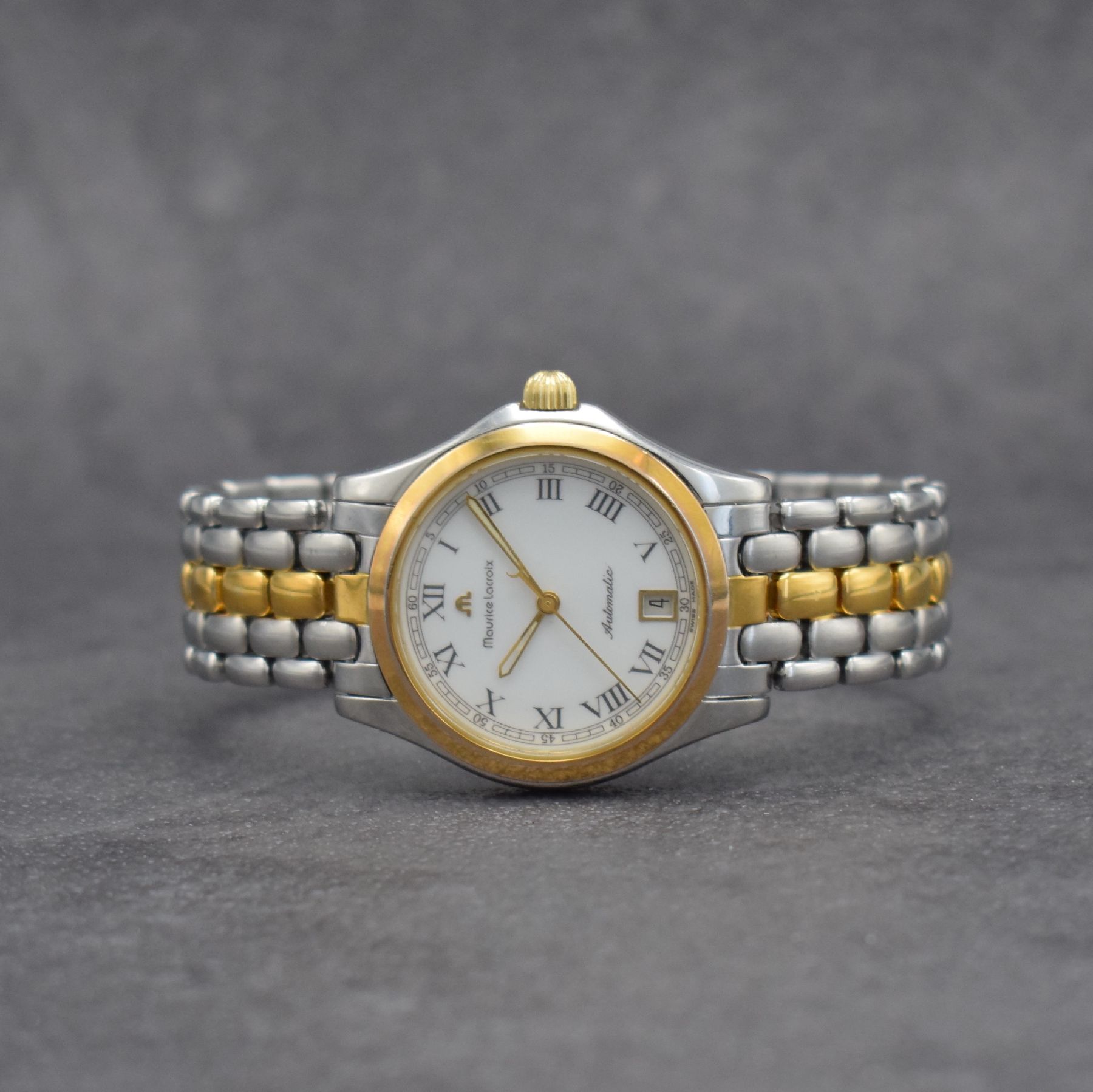MAURICE LACROIX Herrenarmbanduhr in Edelstahl/Gold, Schweiz verk. lt. beil. Pap. 03/1996, Automatik, Boden & Krone verschr., orig. Gliederband m. ...
