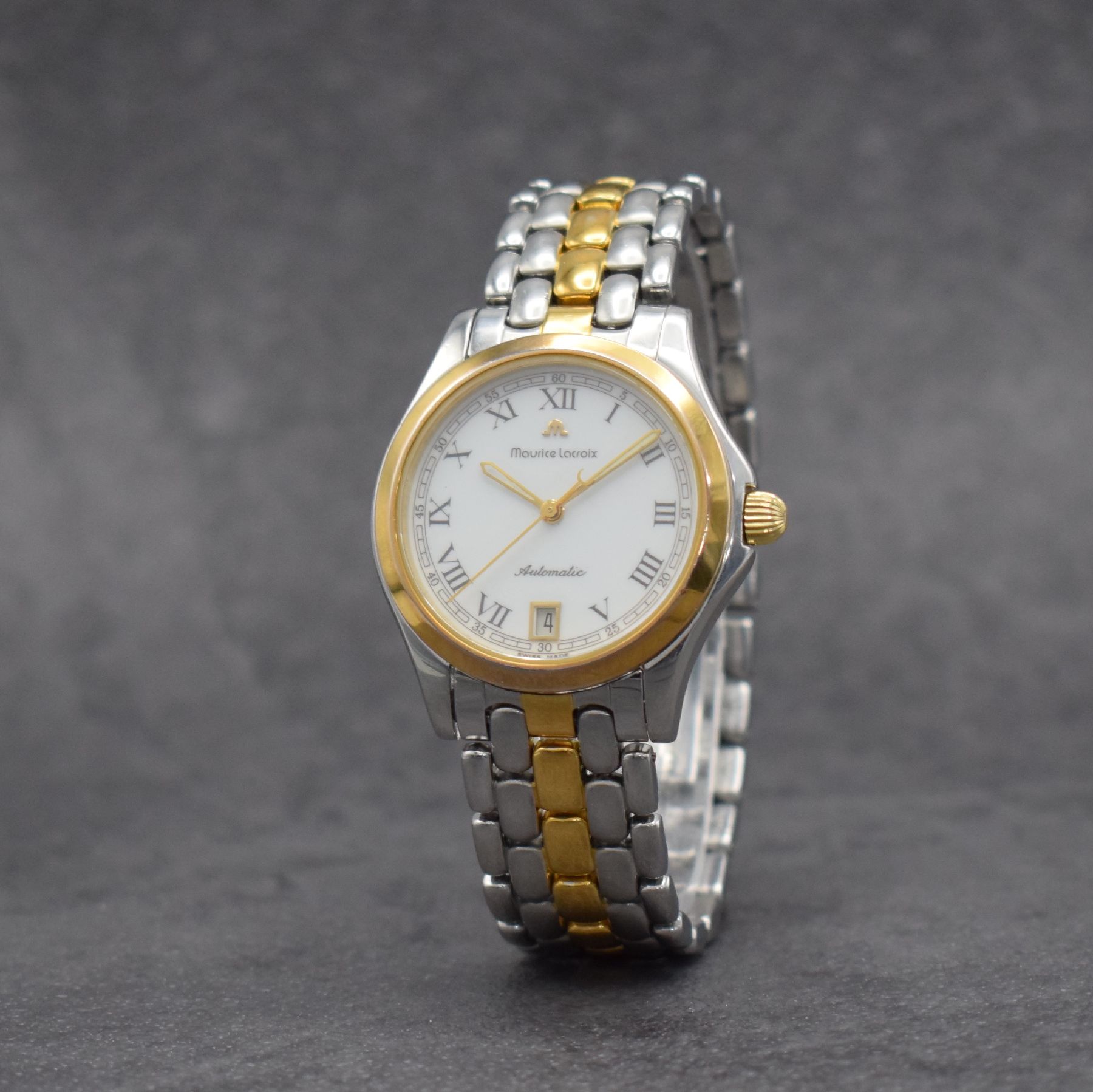 Detail b: MAURICE LACROIX Herrenarmbanduhr in Edelstahl/Gold, Schweiz verk. lt. beil. Pap. 03/1996, Automatik, Boden & Krone verschr., orig. Gliederband m. ...