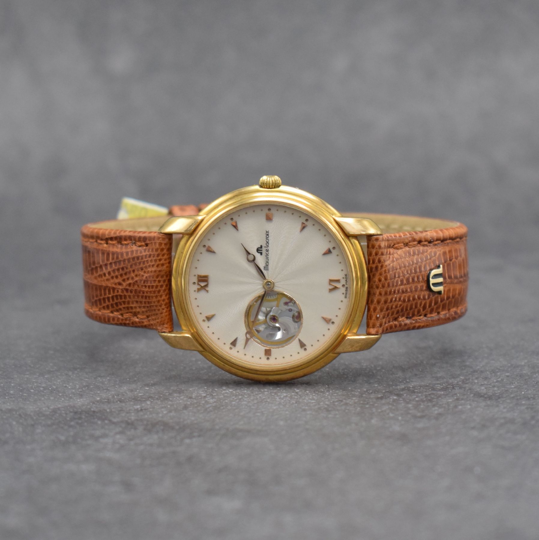 MAURICE LACROIX Herrenarmbanduhr, Schweiz um 1995, Handaufzug, Ref. 38355, verg. Geh. beids. vergl., Boden aufgedr., Maurice Lacroix Lederband m. ...