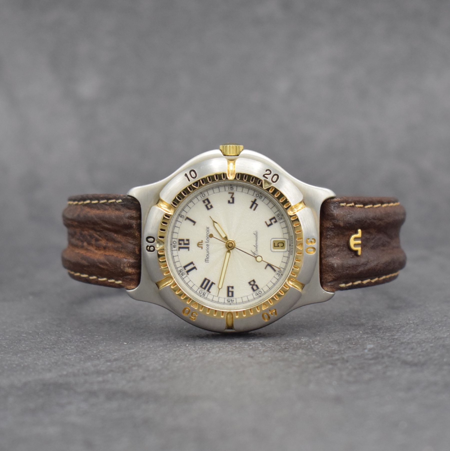 MAURICE LACROIX Diver Herrenarmbanduhr, Schweiz um 1995, Automatik, Ref. 23267, Geh. in Stahl/Gold, Boden verschr., Maurice Lacroix Lederband m. ...
