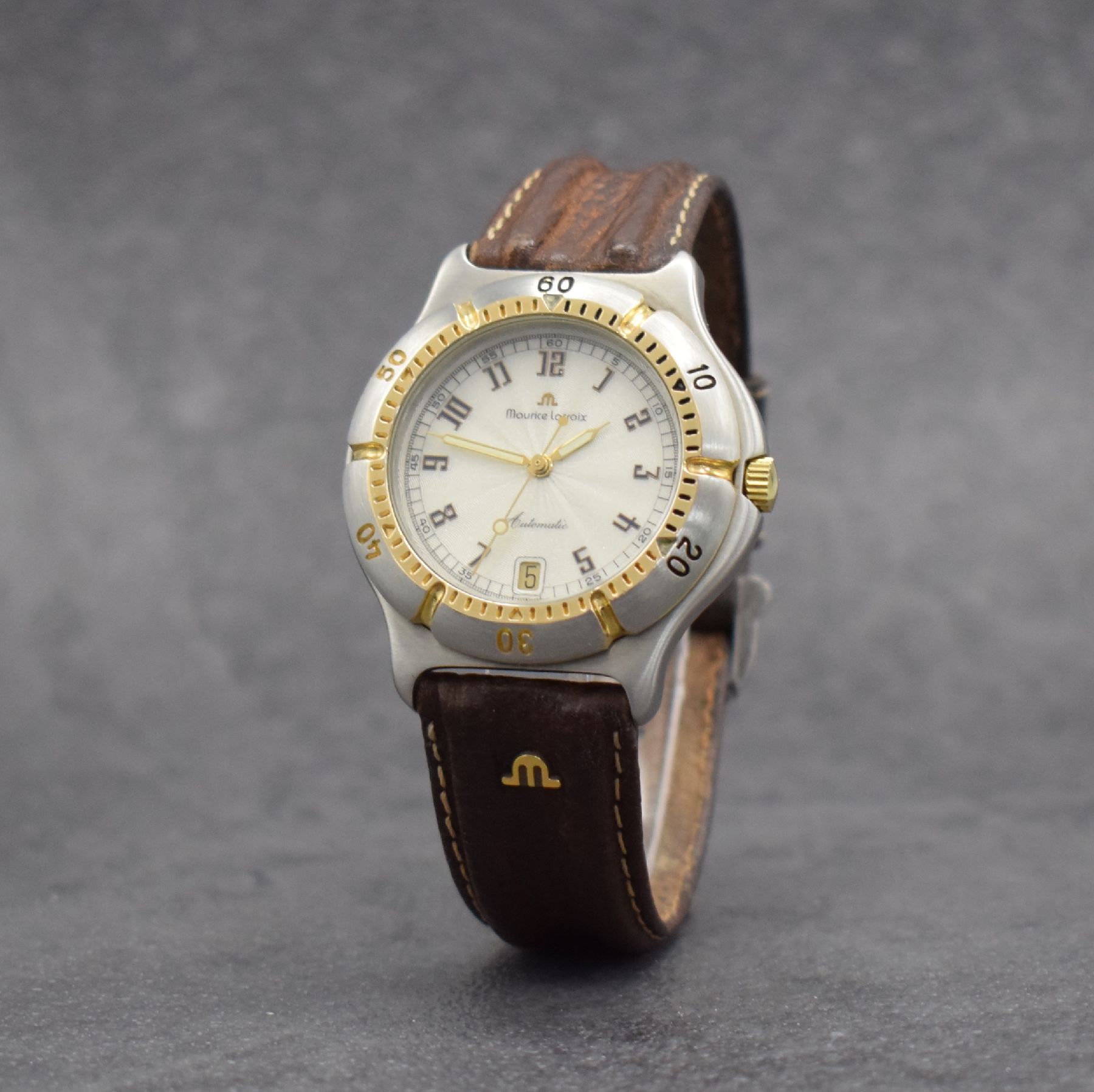 Detail b: MAURICE LACROIX Diver Herrenarmbanduhr, Schweiz um 1995, Automatik, Ref. 23267, Geh. in Stahl/Gold, Boden verschr., Maurice Lacroix Lederband m. ...