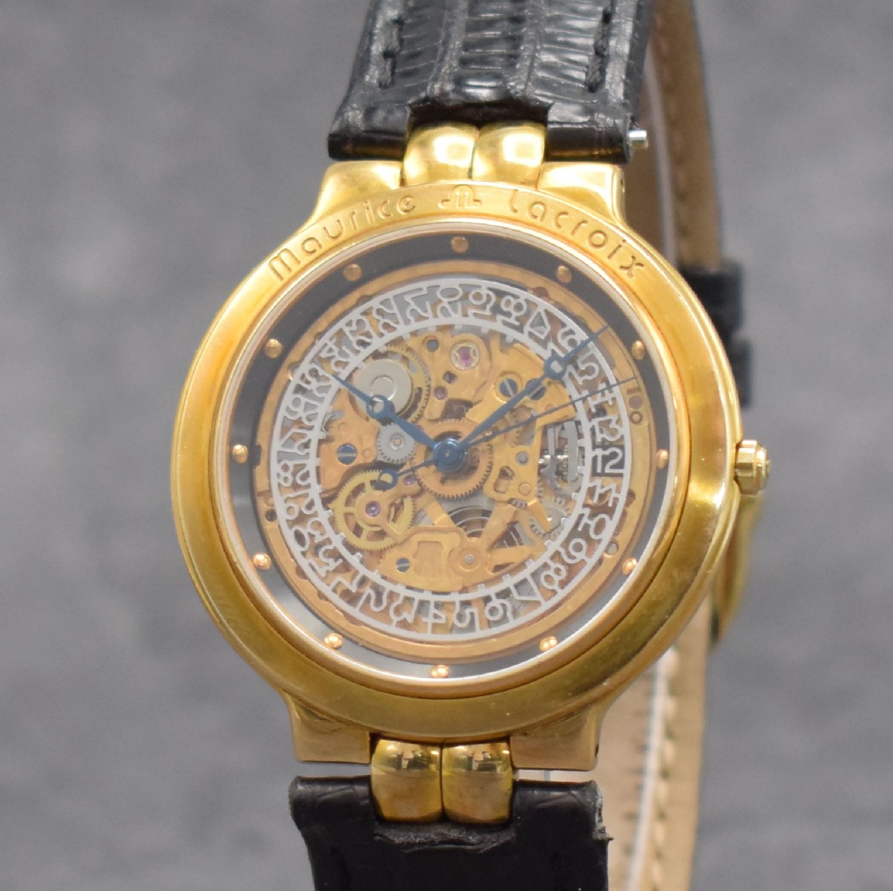 Detail c: MAURICE LACROIX skelettierte Herrenarmbanduhr, Schweiz um 1995, Automatik, verg. Geh. beids. vergl., Boden aufgedr., Maurice Lacroix Lederband m. ...
