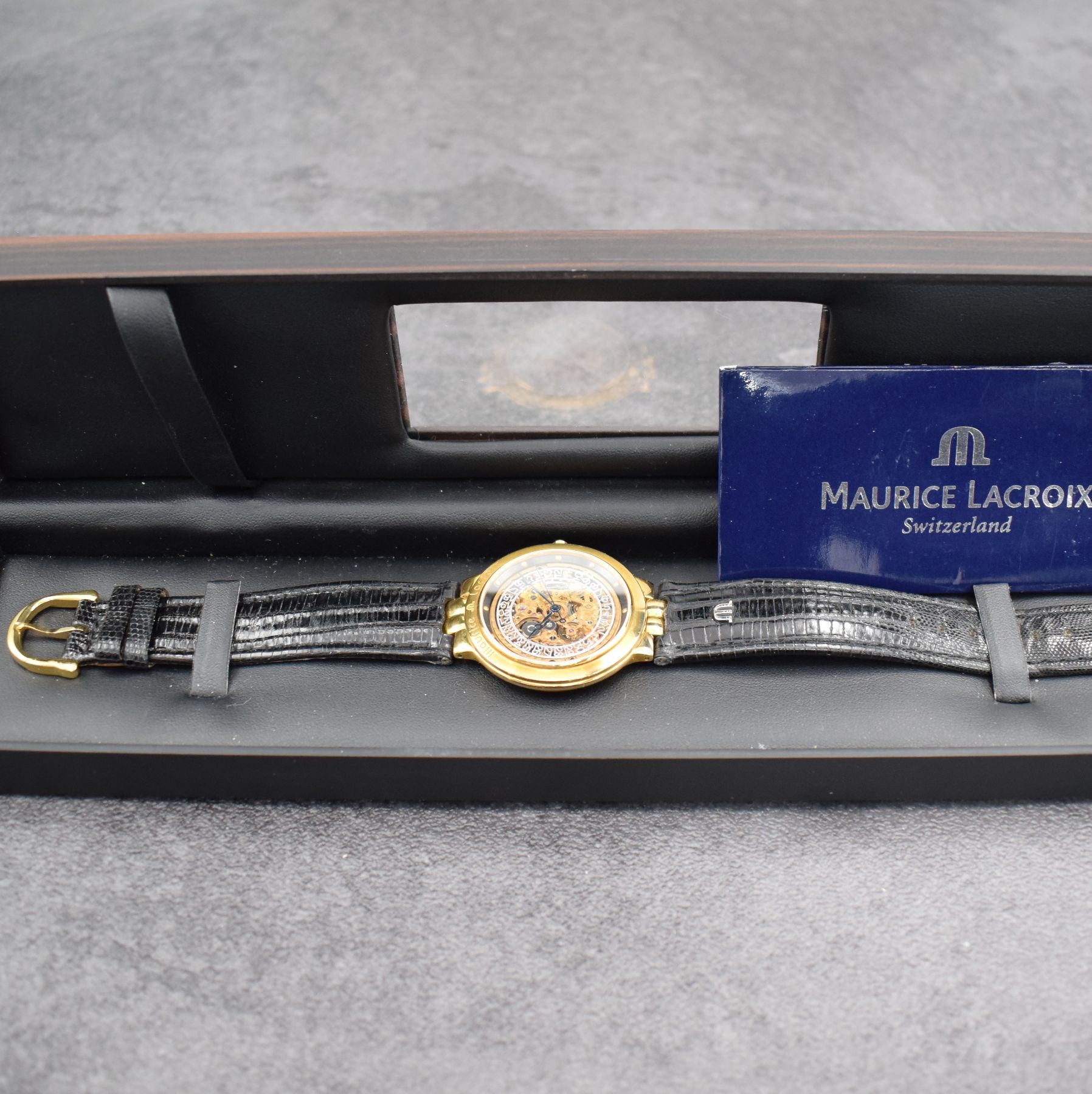 Detail g: MAURICE LACROIX skelettierte Herrenarmbanduhr, Schweiz um 1995, Automatik, verg. Geh. beids. vergl., Boden aufgedr., Maurice Lacroix Lederband m. ...