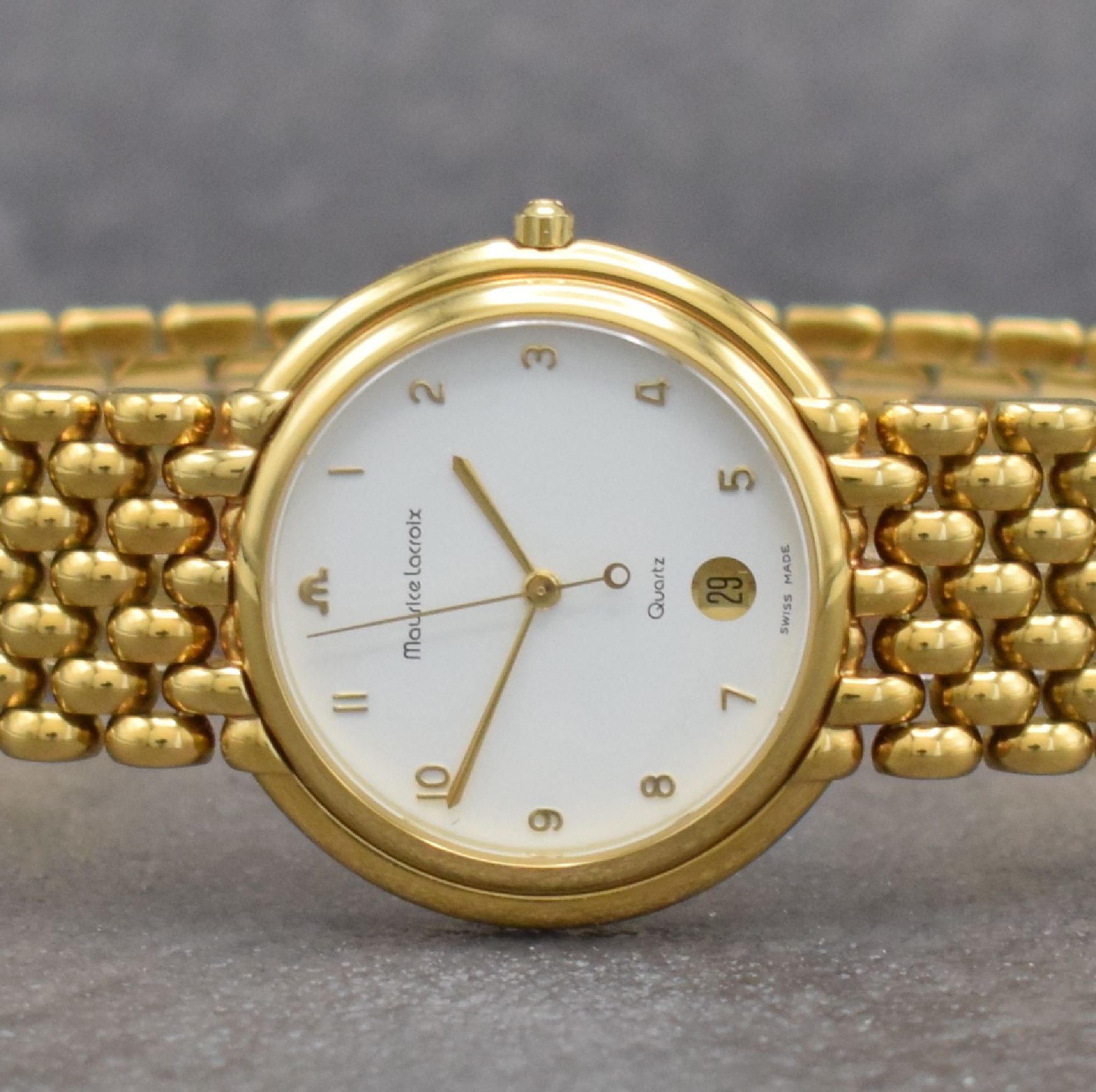 Detail a: MAURICE LACROIX Herrenarmbanduhr, Schweiz um 2000, quarz, verg. Stahlgeh., Boden aufgedr., verg. Maurice Lacroix Gliederband, weißes Zifferbl. m. ...