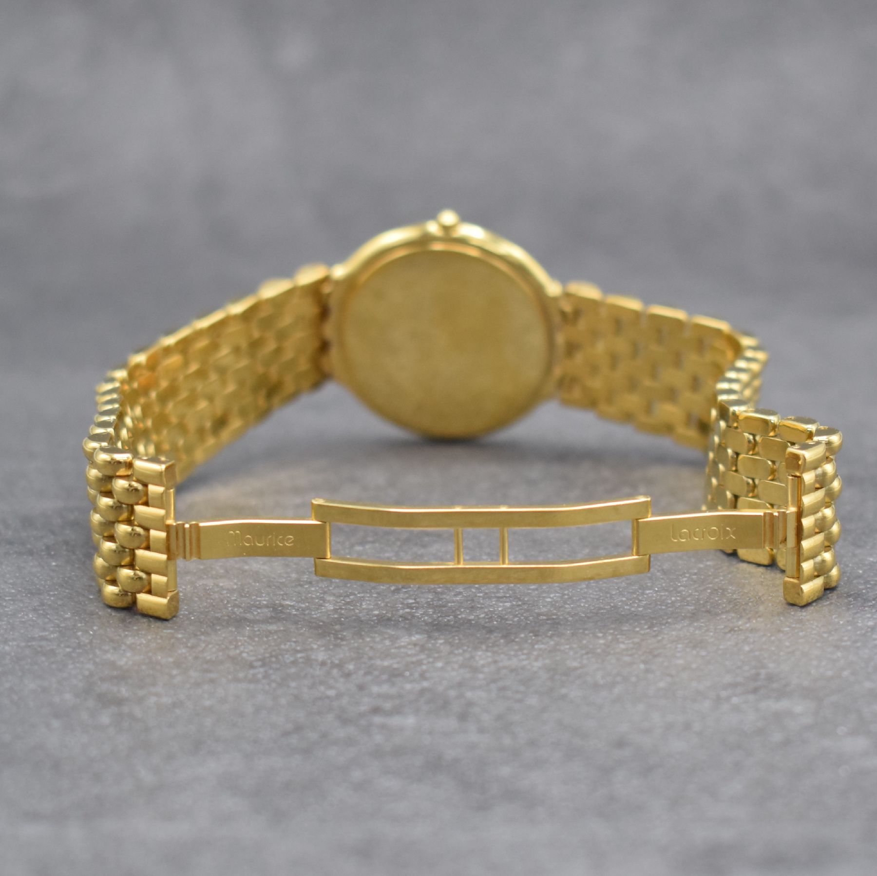 Detail d: MAURICE LACROIX Herrenarmbanduhr, Schweiz um 2000, quarz, verg. Stahlgeh., Boden aufgedr., verg. Maurice Lacroix Gliederband, weißes Zifferbl. m. ...