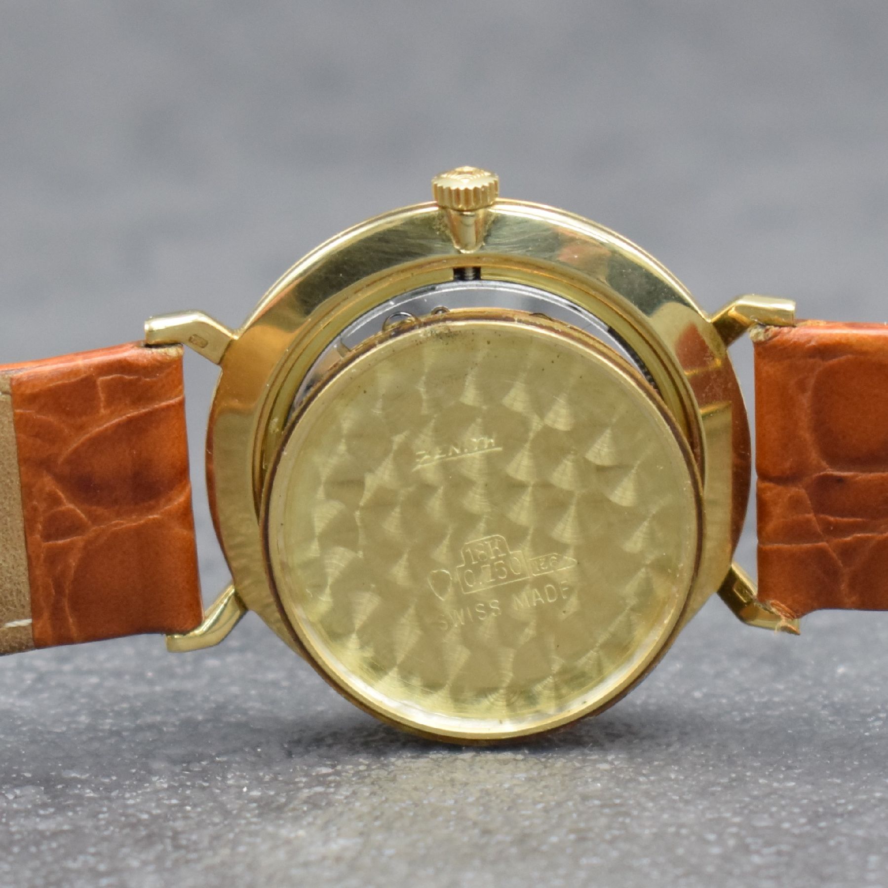 Detail g: ZENITH Herrenarmbanduhr in GG 750/000, Handaufzug, Schweiz um 1982, Boden & Glasrand aufgedr., vers. Zifferbl. m. aufgel. Indizes l. fl., Anz. v. ...