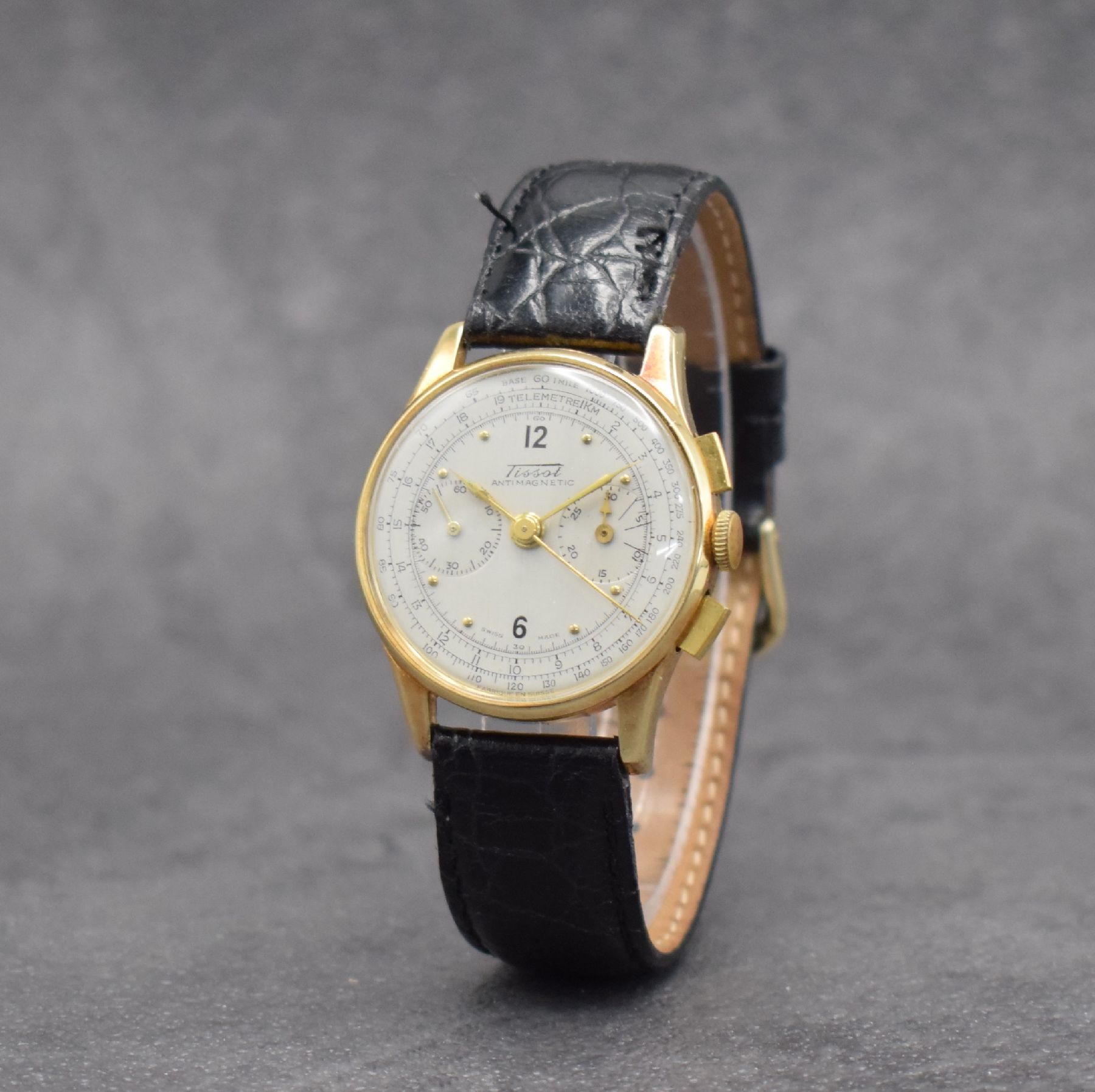 Detail b: TISSOT seltener Schaltradchronograph in GG 585/000, Handaufzug, Schweiz um 1940, Boden & Glasrand aufgedr., Zifferbl. rest., 30 Min.- Stoppz., Tele- ...