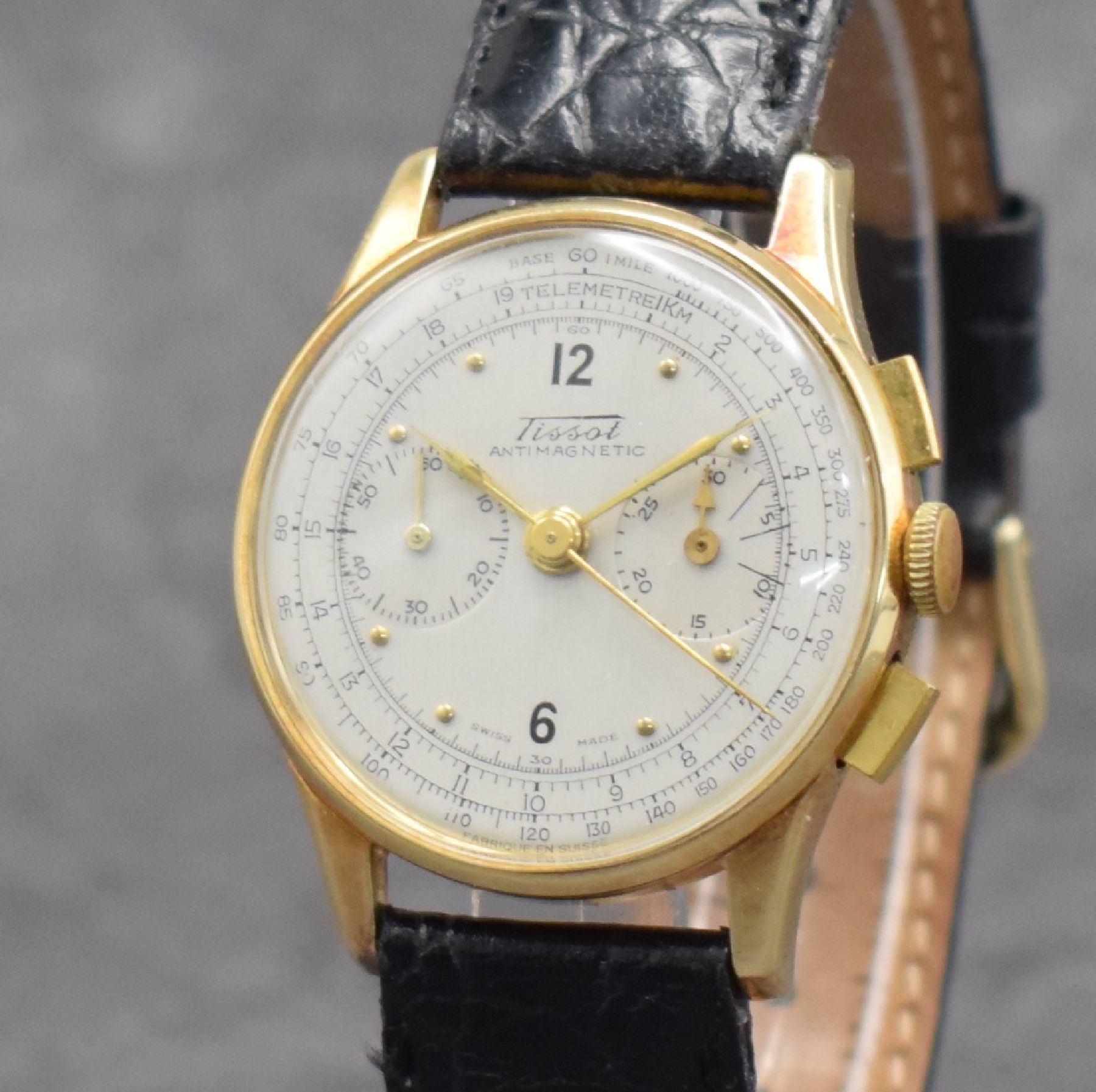 Detail c: TISSOT seltener Schaltradchronograph in GG 585/000, Handaufzug, Schweiz um 1940, Boden & Glasrand aufgedr., Zifferbl. rest., 30 Min.- Stoppz., Tele- ...