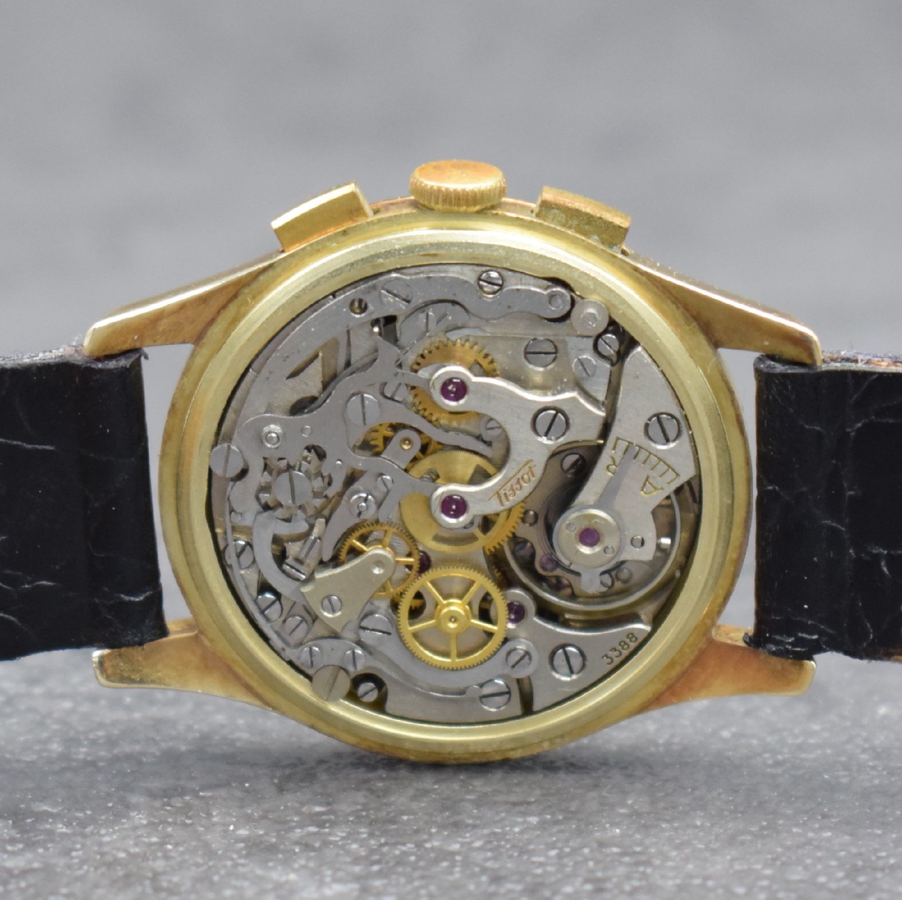 Detail e: TISSOT seltener Schaltradchronograph in GG 585/000, Handaufzug, Schweiz um 1940, Boden & Glasrand aufgedr., Zifferbl. rest., 30 Min.- Stoppz., Tele- ...
