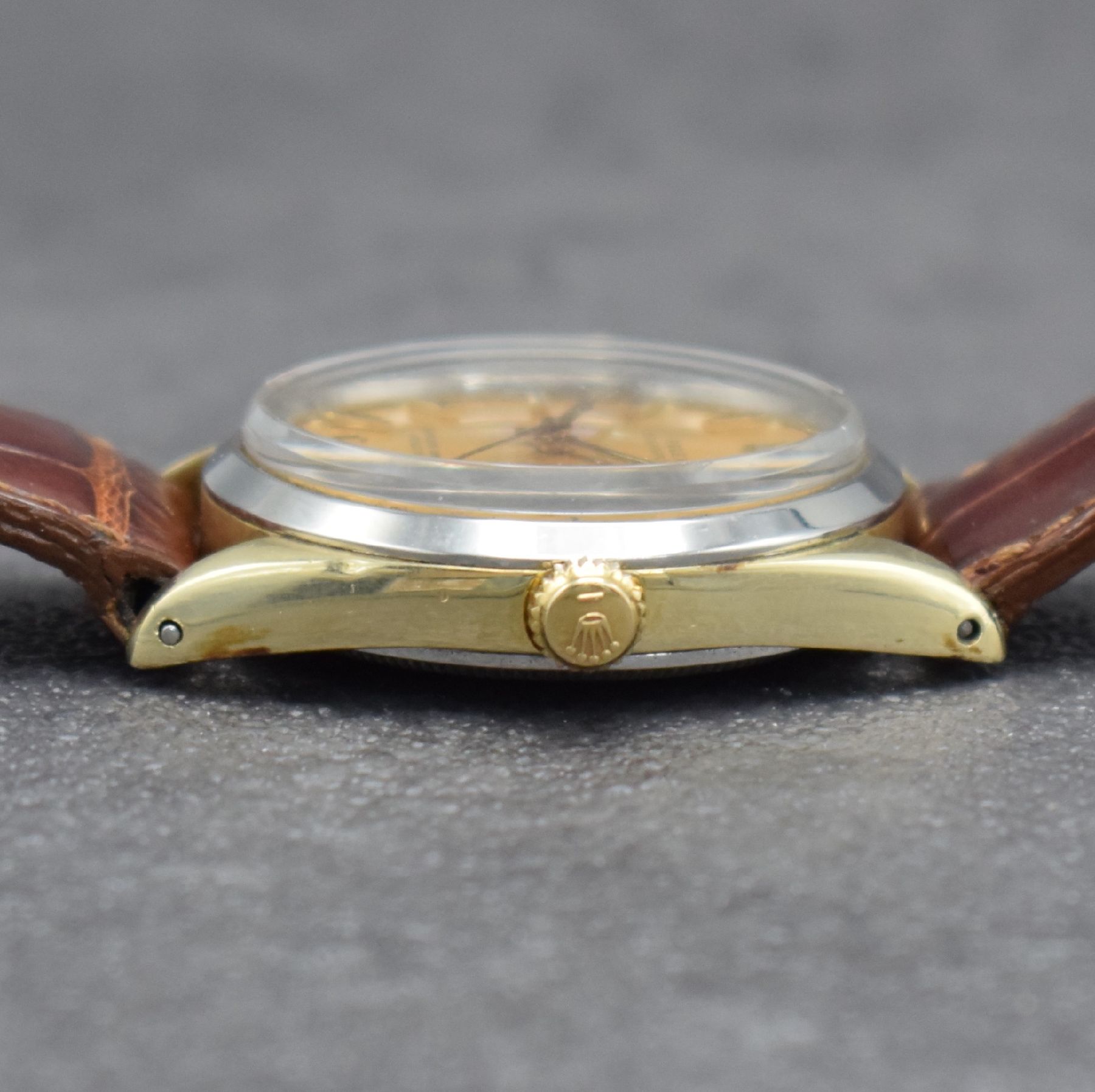 Detail d: ROLEX Oyster Perpetual Herrenarmbanduhr, Schweiz um 1965, Ref. 1025, Automatik, verschr. Stahlgeh. m. Goldkappe, Stahl-Lünette ersetzt, Geh.-Nr. ...