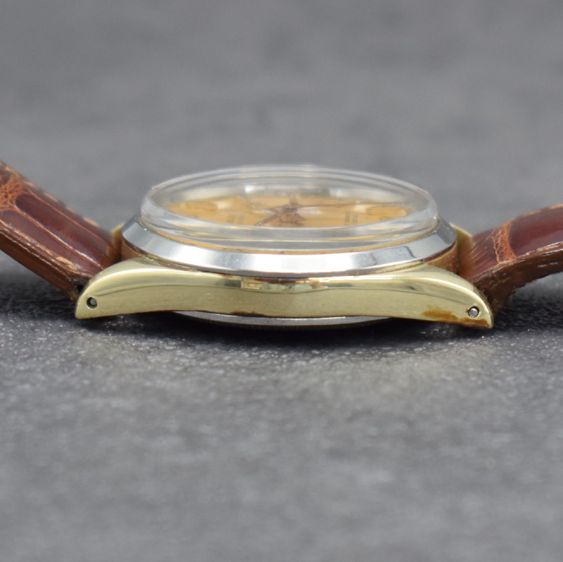 Detail e: ROLEX Oyster Perpetual Herrenarmbanduhr, Schweiz um 1965, Ref. 1025, Automatik, verschr. Stahlgeh. m. Goldkappe, Stahl-Lünette ersetzt, Geh.-Nr. ...