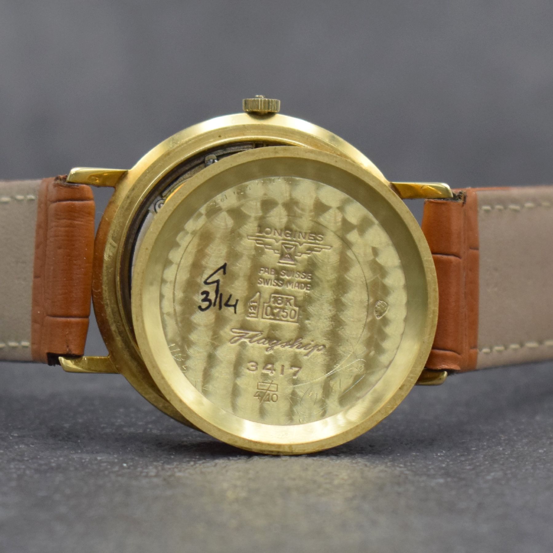 Detail h: LONGINES Flagship Herrenarmbanduhr in GG 750/000 Ref. 3417, Schweiz um 1966, Automatik, 3-teil. Geh. l. dell., Boden entsprechend Symbolik & Glasrand ...