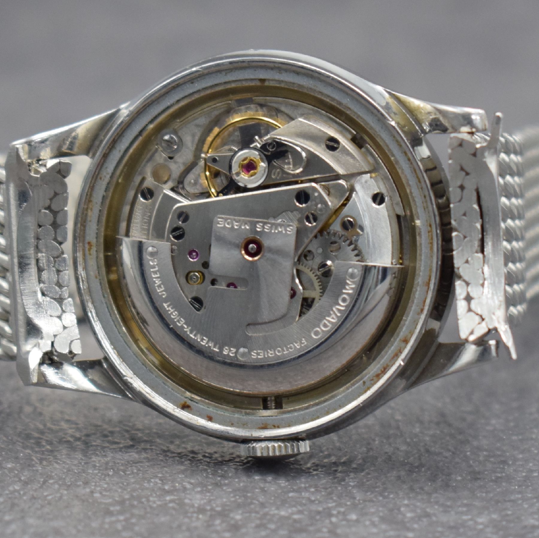 Detail i: MOVADO Kingmatic Chronometer Herrenarmbanduhr in Edelstahl, Schweiz um 1965, Automatik, Sub-Sea Gehäuse m. geschr. Boden, Movado Stahlband m. ...