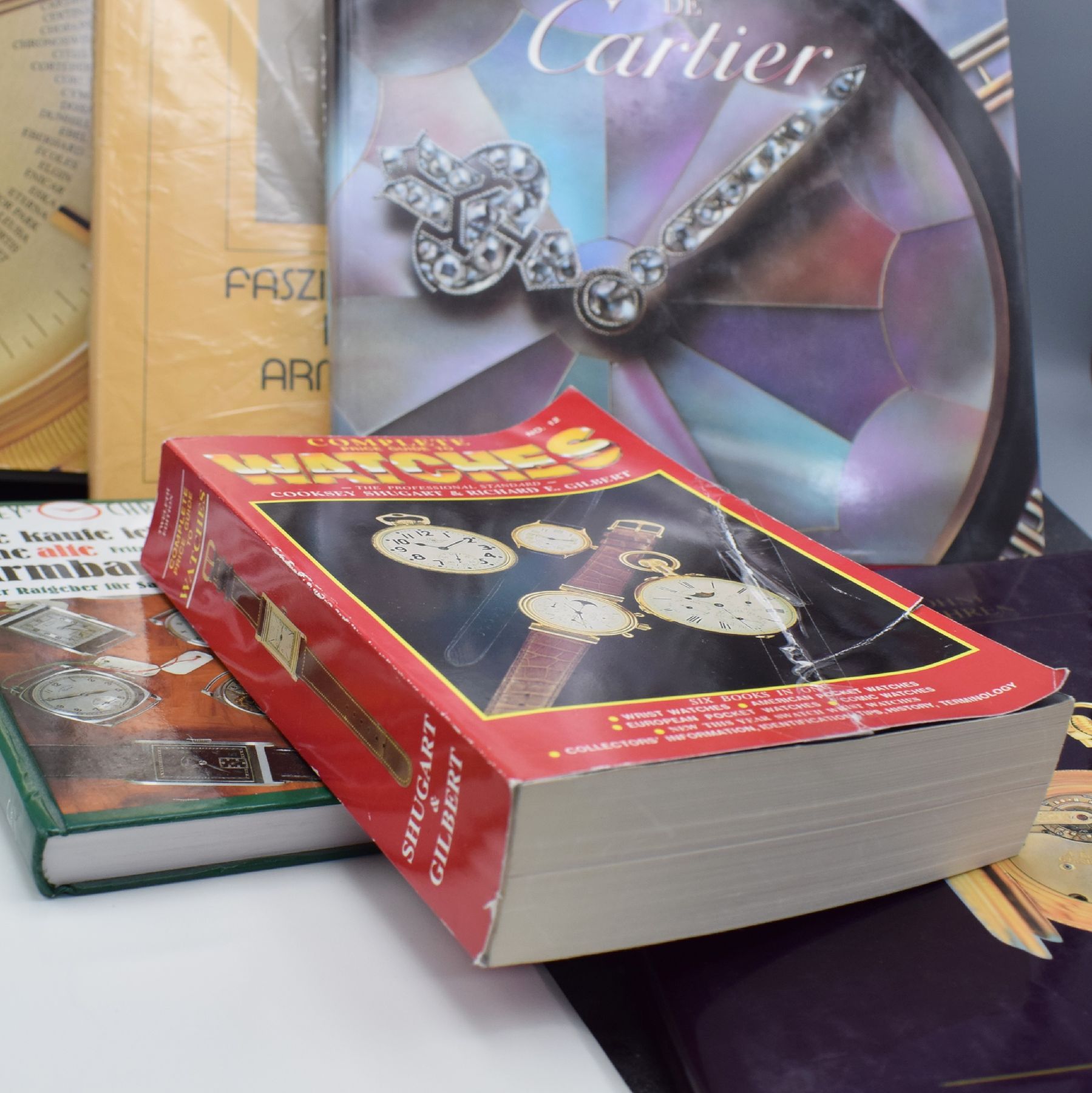 Detail a: 4 Uhrenbücher, 1) Le Temps De Cartier, v. J.B arracca, G. Negretti & F. Negretti, 2) Wristwatches - Armbanduhren v. G. L. Brunner & Ch. ...