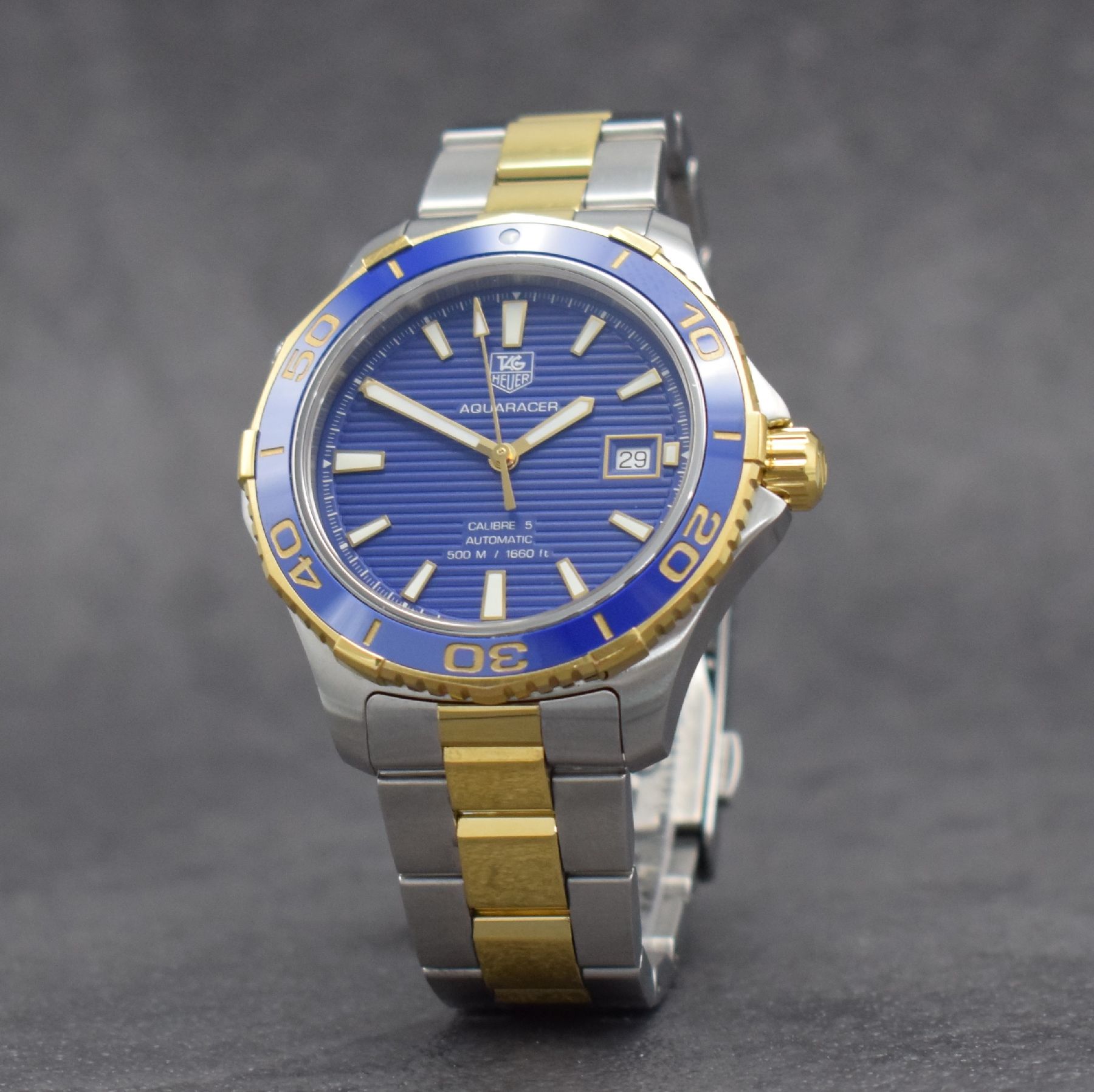 Detail b: TAG HEUER Herrenarmbanduhr Aquaracer Calibre 5, Automatik, Ref. WAK2120, Edelstahlgeh. inkl. Gliederband m. Faltschl. z. T. verg., Boden & Krone ...
