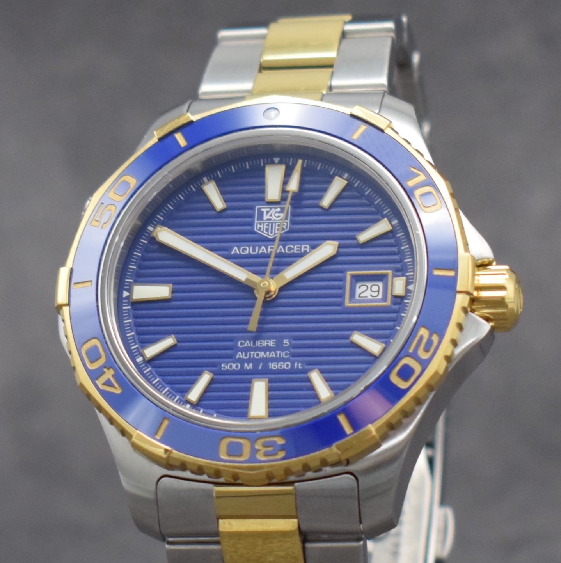 Detail c: TAG HEUER Herrenarmbanduhr Aquaracer Calibre 5, Automatik, Ref. WAK2120, Edelstahlgeh. inkl. Gliederband m. Faltschl. z. T. verg., Boden & Krone ...