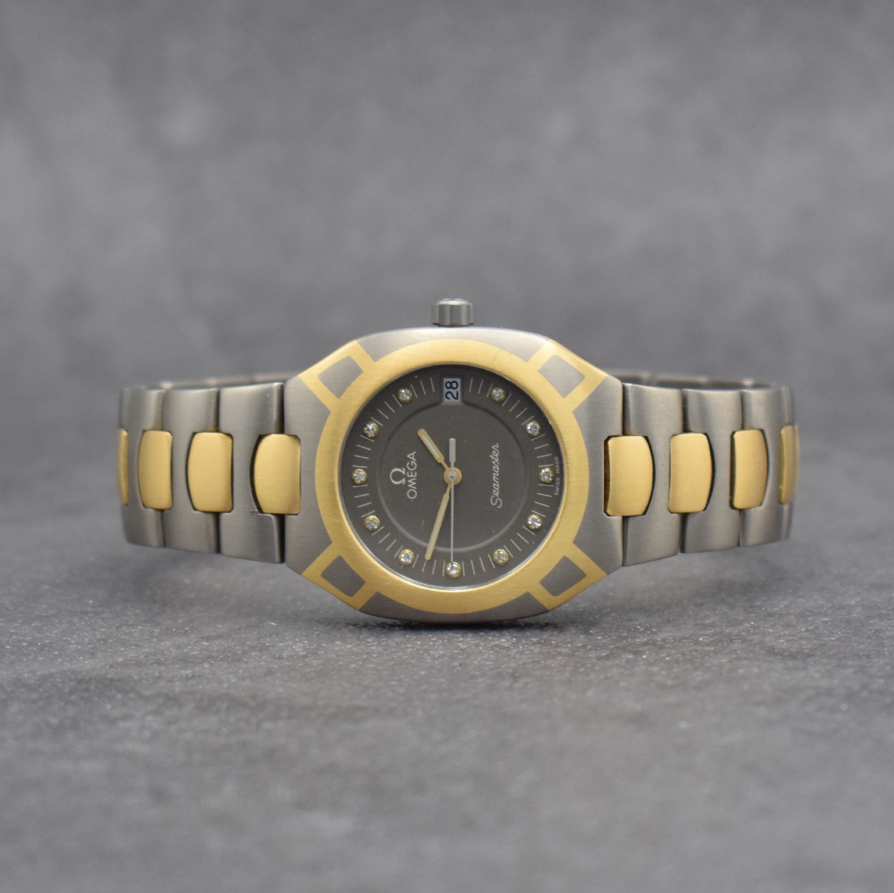 OMEGA Herrenarmbanduhr Modell Seamaster Polaris, Schweiz um 1980, Ref. 1960257/3960952, goldintarsiertes Titangeh. inkl. Gliederband in Titan/Gold m. ...