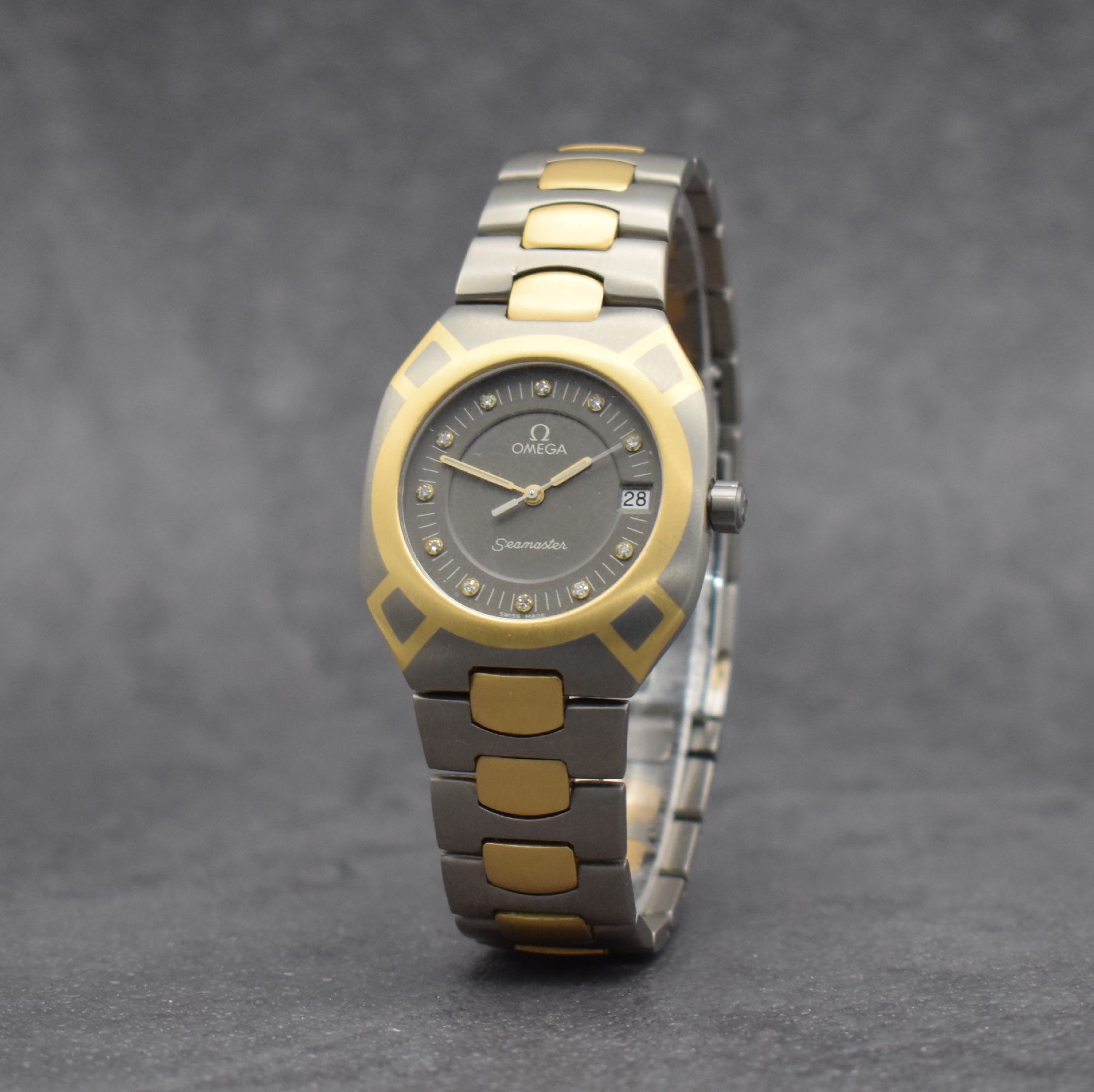 Detail b: OMEGA Herrenarmbanduhr Modell Seamaster Polaris, Schweiz um 1980, Ref. 1960257/3960952, goldintarsiertes Titangeh. inkl. Gliederband in Titan/Gold m. ...