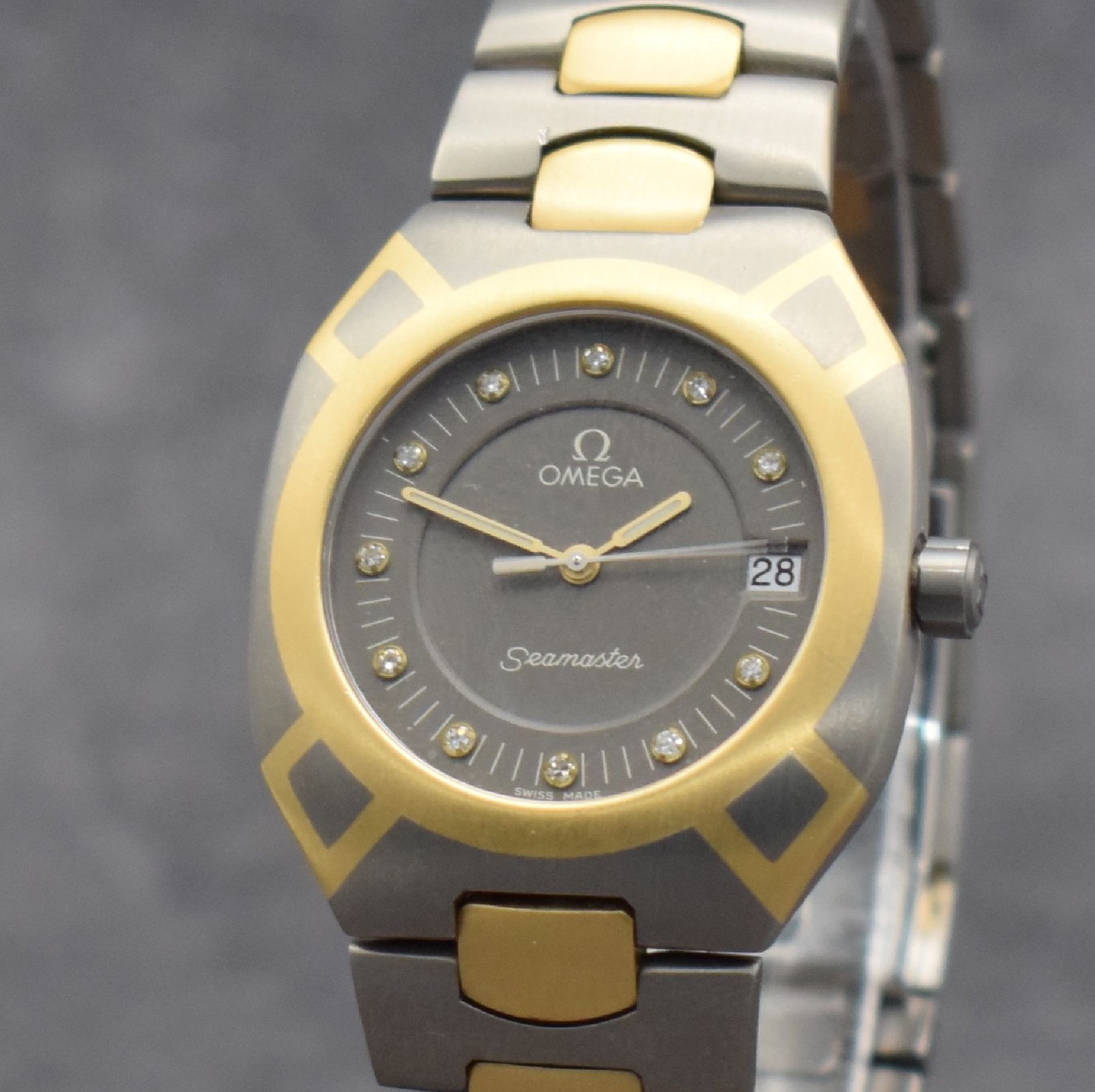 Detail c: OMEGA Herrenarmbanduhr Modell Seamaster Polaris, Schweiz um 1980, Ref. 1960257/3960952, goldintarsiertes Titangeh. inkl. Gliederband in Titan/Gold m. ...