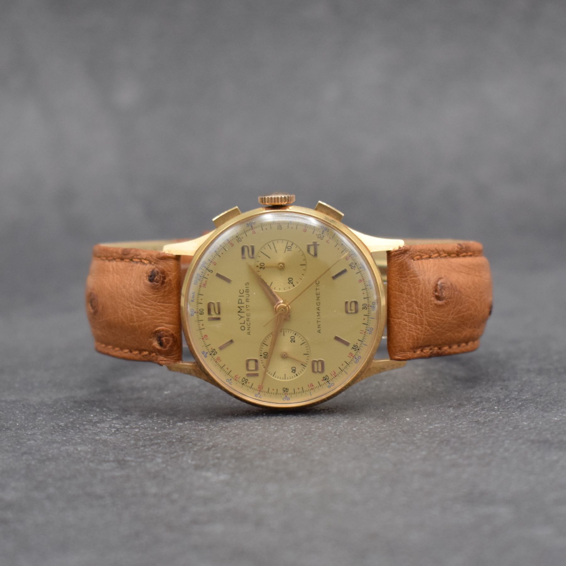 OLYMPIC Armbandchronograph in RoseG 750/000, Handaufzug, Schweiz um 1950, Boden & Glasrand aufgedr., Metallcuv. zur Armierung, Tele- & ...