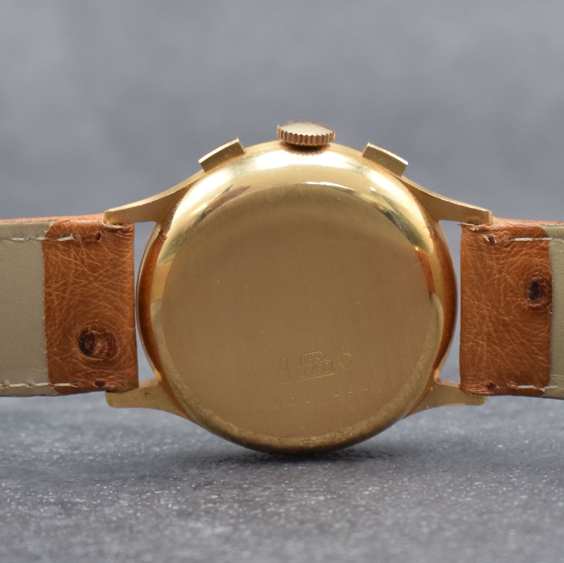 Detail e: OLYMPIC Armbandchronograph in RoseG 750/000, Handaufzug, Schweiz um 1950, Boden & Glasrand aufgedr., Metallcuv. zur Armierung, Tele- & ...
