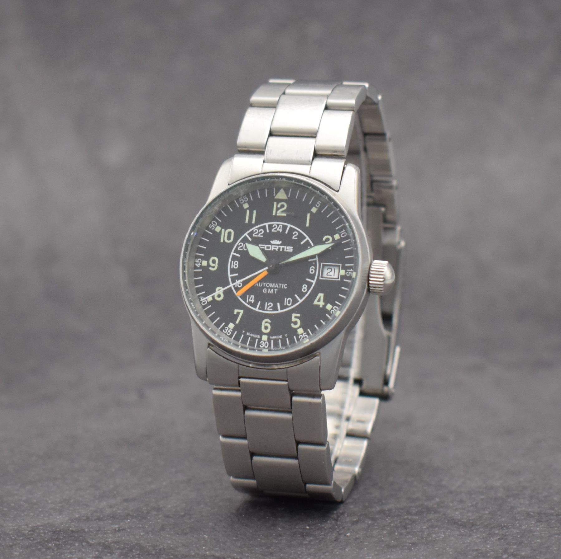 Detail b: FORTIS GMT Armbanduhr in Stahl/Stahlband, Schweiz um 1990, Automatik, mattiertes Geh. Ref. 621.10.148, Boden & Krone verschr., schwarzes Zifferbl., ...
