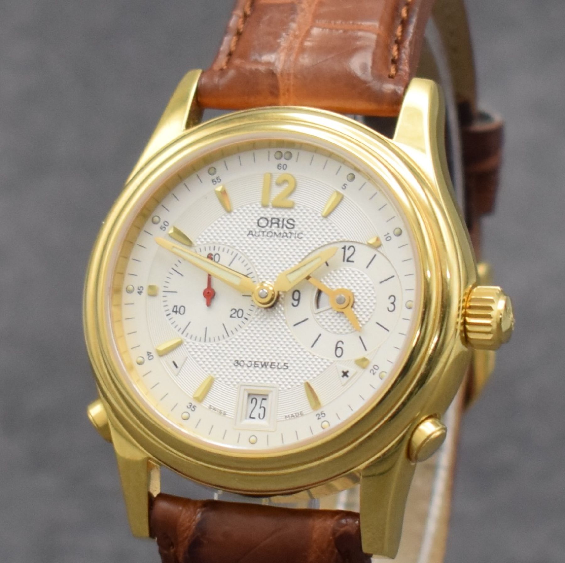Detail c: ORIS Herrenarmbanduhr mit zweiter Zeitzone, Schweiz um 2000, Automatik, vergold. Stahlgeh. Ref. 7485, beids. Saphirvergl., Boden & Krone verschr., ...