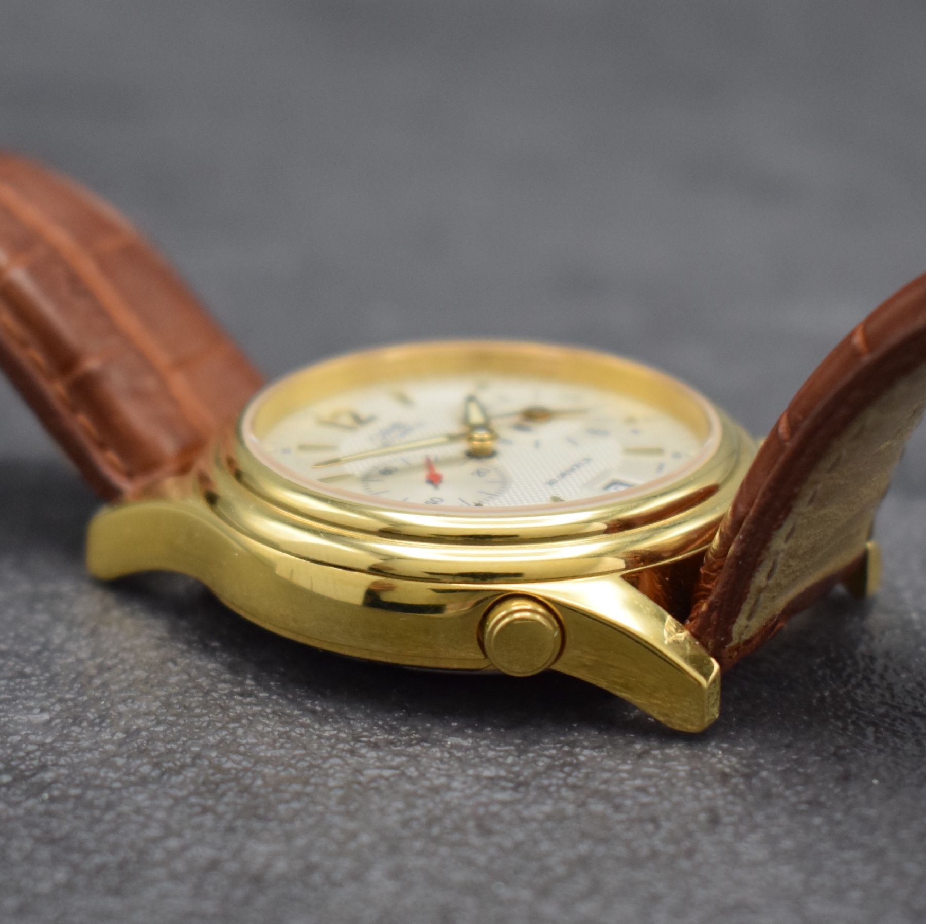 Detail e: ORIS Herrenarmbanduhr mit zweiter Zeitzone, Schweiz um 2000, Automatik, vergold. Stahlgeh. Ref. 7485, beids. Saphirvergl., Boden & Krone verschr., ...