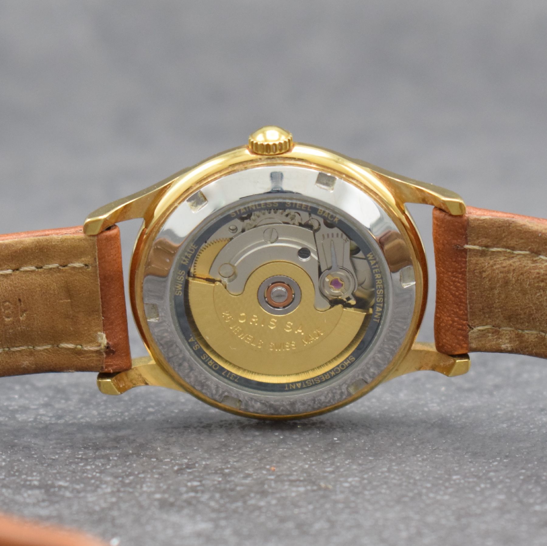 Detail e: ORIS vergoldete Armbanduhr mit Datum, Schweiz um 2000, Automatik, beids. vergl., Ref. 7317, Stahlboden verschr., silb. Duoton- Zifferbl., gold. arab. ...