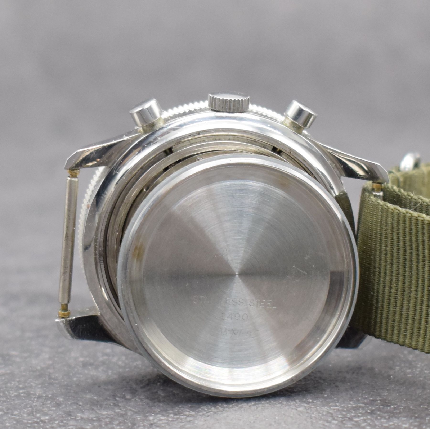 Detail h: BREGUET sehr seltener Flieger-Chronograph mit Flyback in Stahl, Schweiz um 1970, Handaufzug, verschr. Geh., Krone später, schwarze Drehlünette m. ...