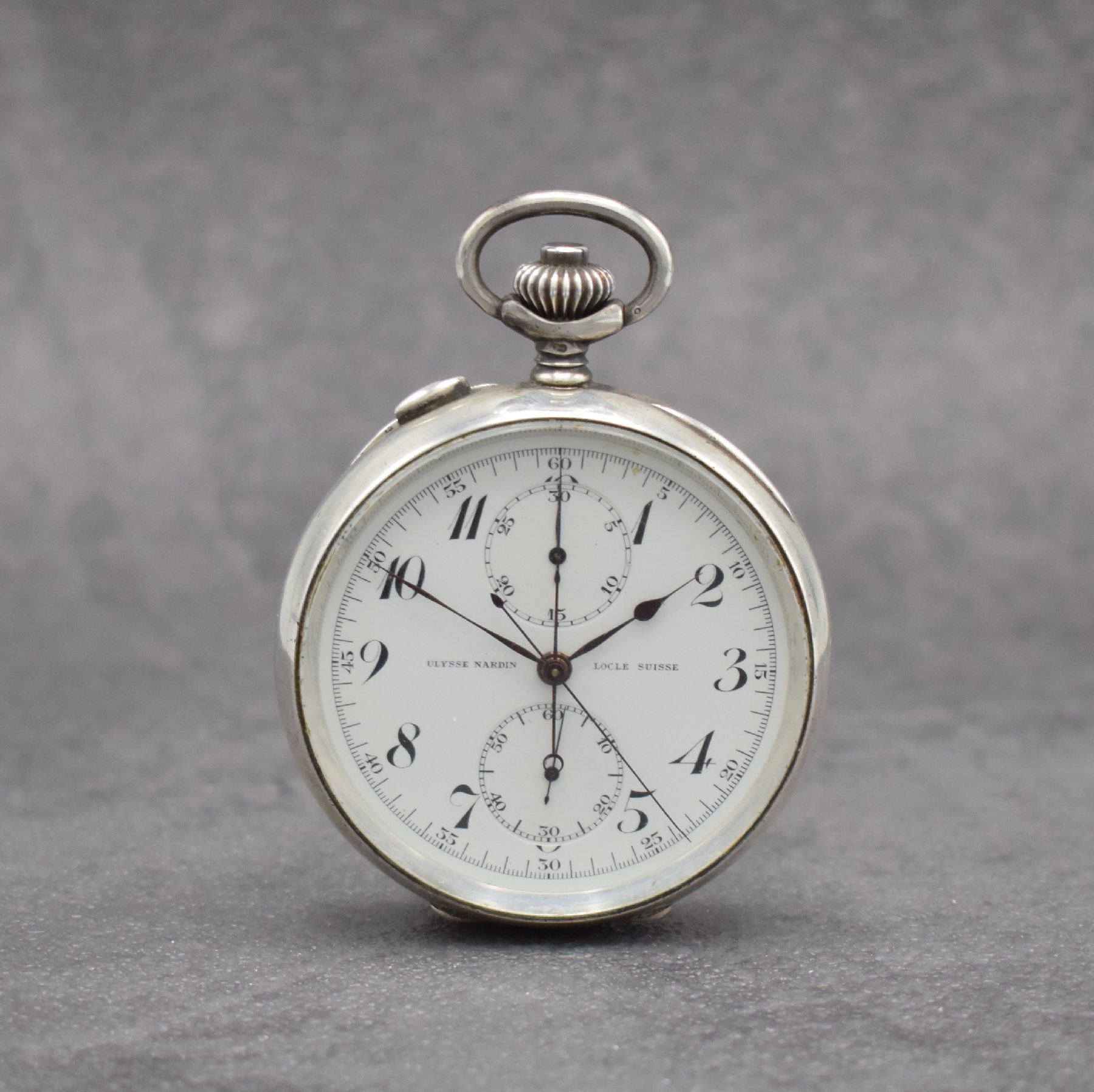ULYSSE NARDIN seltene Taschenuhr mit Chronograph Rattrapante in 925er Silber, Schweiz um 1930, glattes Geh., Silbercuvette, Emailzifferbl. m. arab. ...