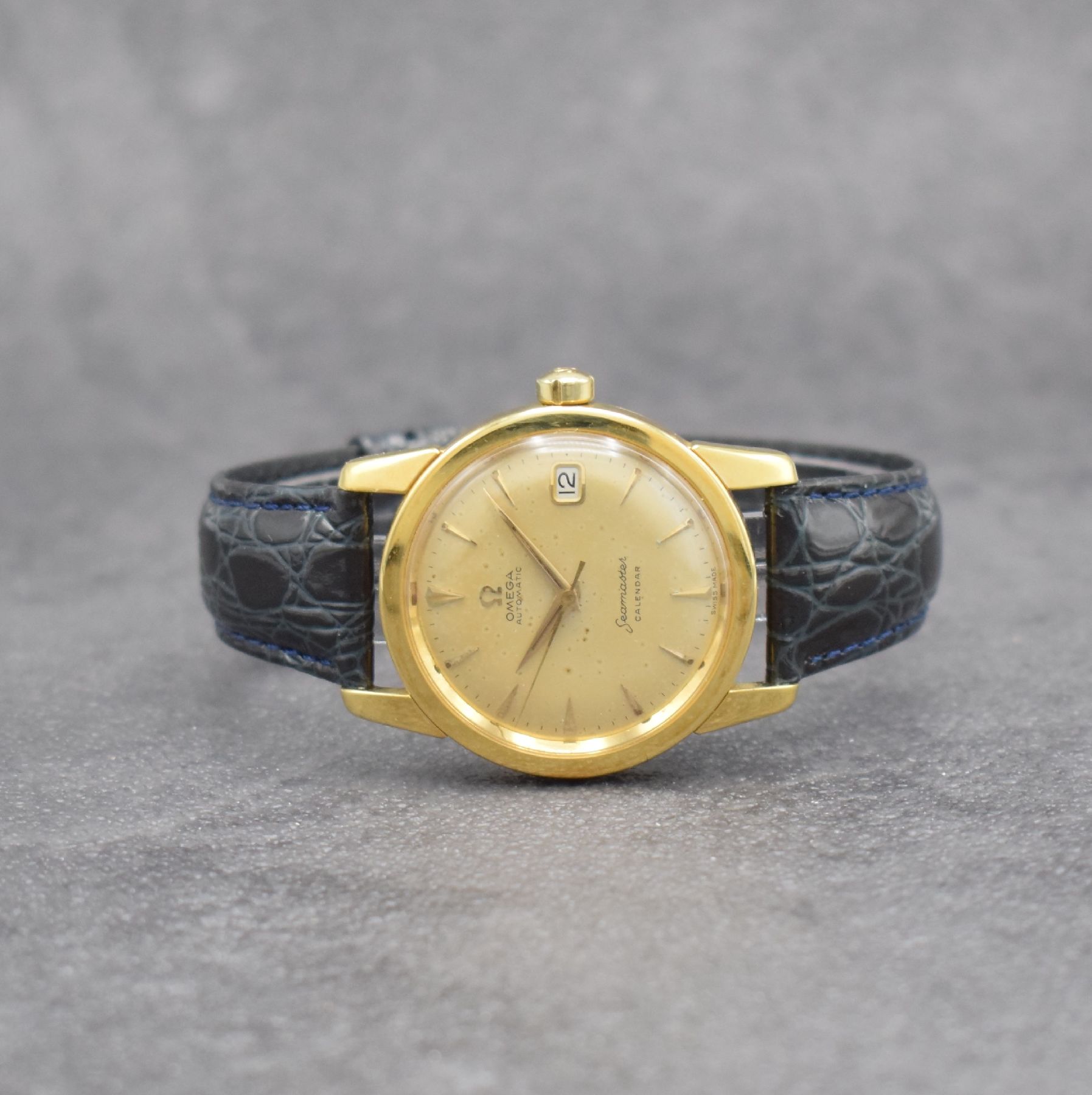 OMEGA Herrenarmbanduhr Serie Seamaster Calendar in GG 750/000, Automatik, Schweiz um 1957, Ref. 2849 SC, Boden & Glasrand aufgedr., Lederband m. ...