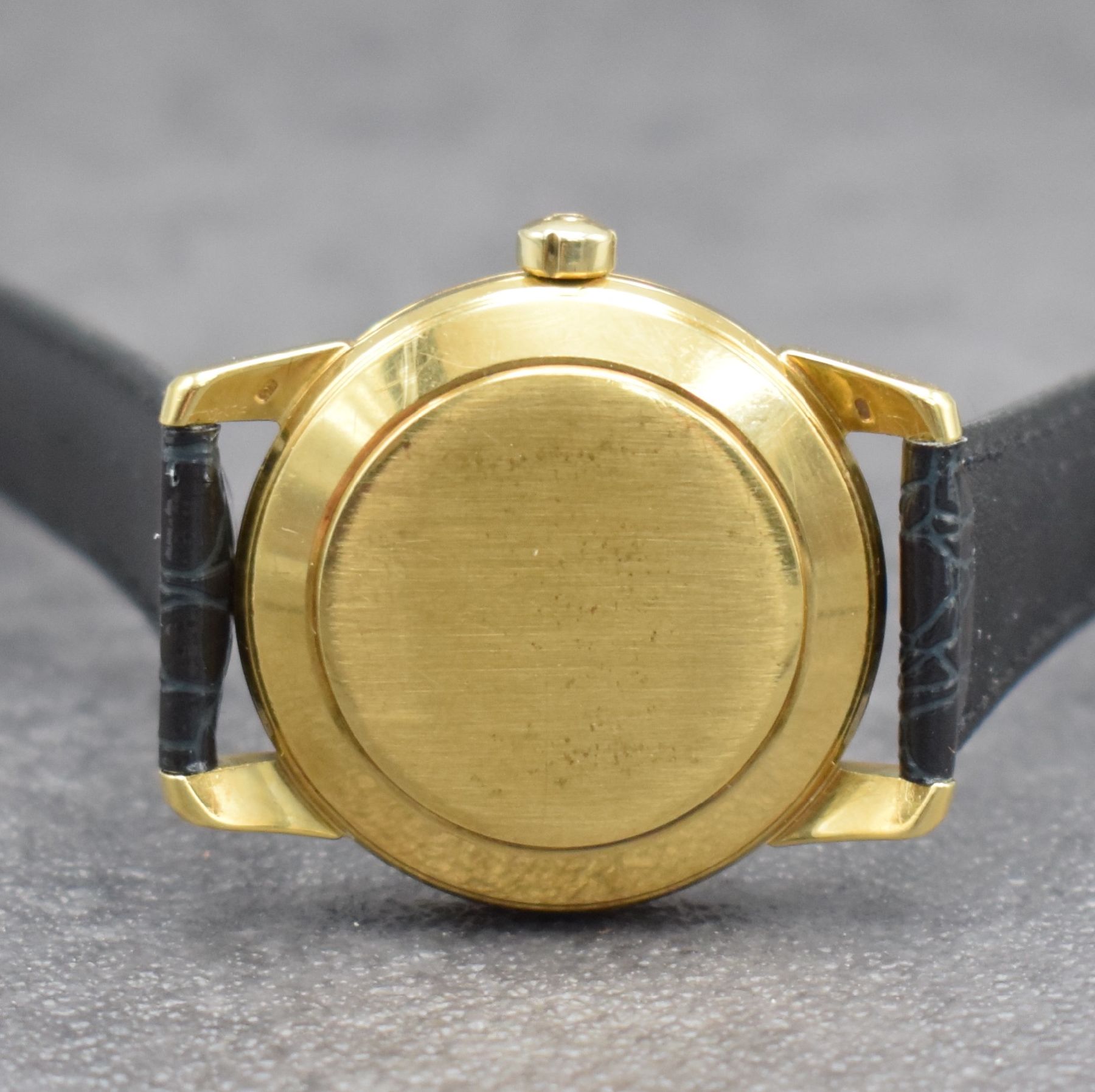 Detail e: OMEGA Herrenarmbanduhr Serie Seamaster Calendar in GG 750/000, Automatik, Schweiz um 1957, Ref. 2849 SC, Boden & Glasrand aufgedr., Lederband m. ...