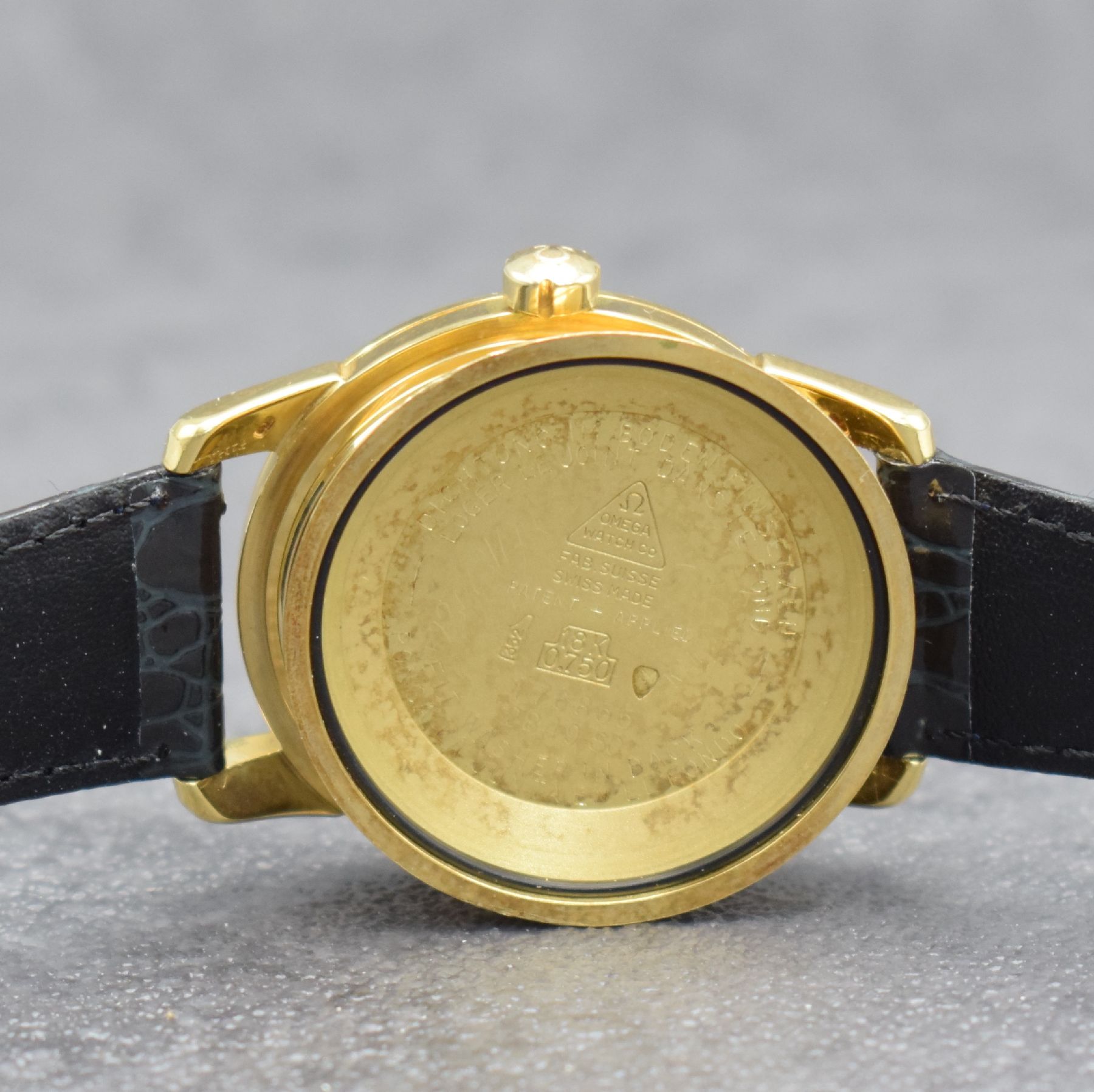 Detail h: OMEGA Herrenarmbanduhr Serie Seamaster Calendar in GG 750/000, Automatik, Schweiz um 1957, Ref. 2849 SC, Boden & Glasrand aufgedr., Lederband m. ...