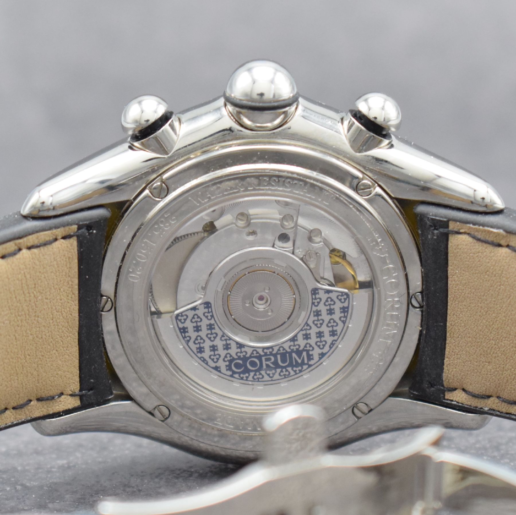 Detail e: CORUM Bubble Armbandchronograph in Stahl, Schweiz um 2010, Automatik, beids. vergl. Geh. Ref. 285.150.20, Boden & Krone verschr., gelbes Zifferbl., ...
