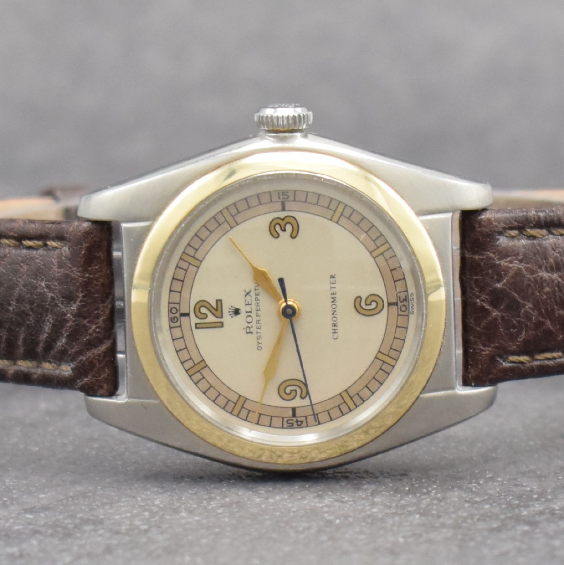 Detail a: ROLEX Chronometer Herrenarmbanduhr Oyster Perpetual Bubble Back in Stahl mit Goldlünette Referenz 4392, Automatik, Schweiz um 1949, Lederband m. ...