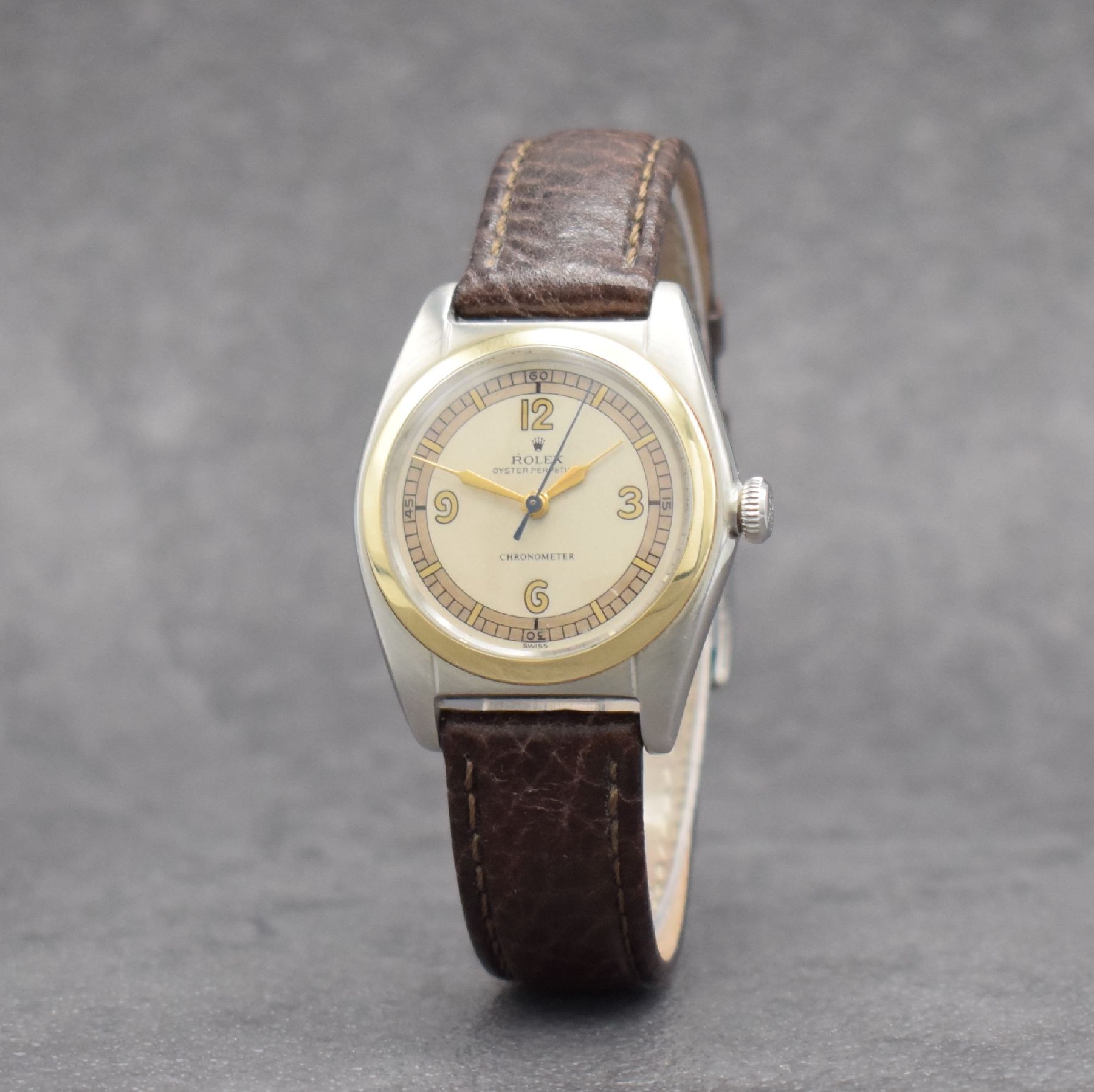 Detail b: ROLEX Chronometer Herrenarmbanduhr Oyster Perpetual Bubble Back in Stahl mit Goldlünette Referenz 4392, Automatik, Schweiz um 1949, Lederband m. ...