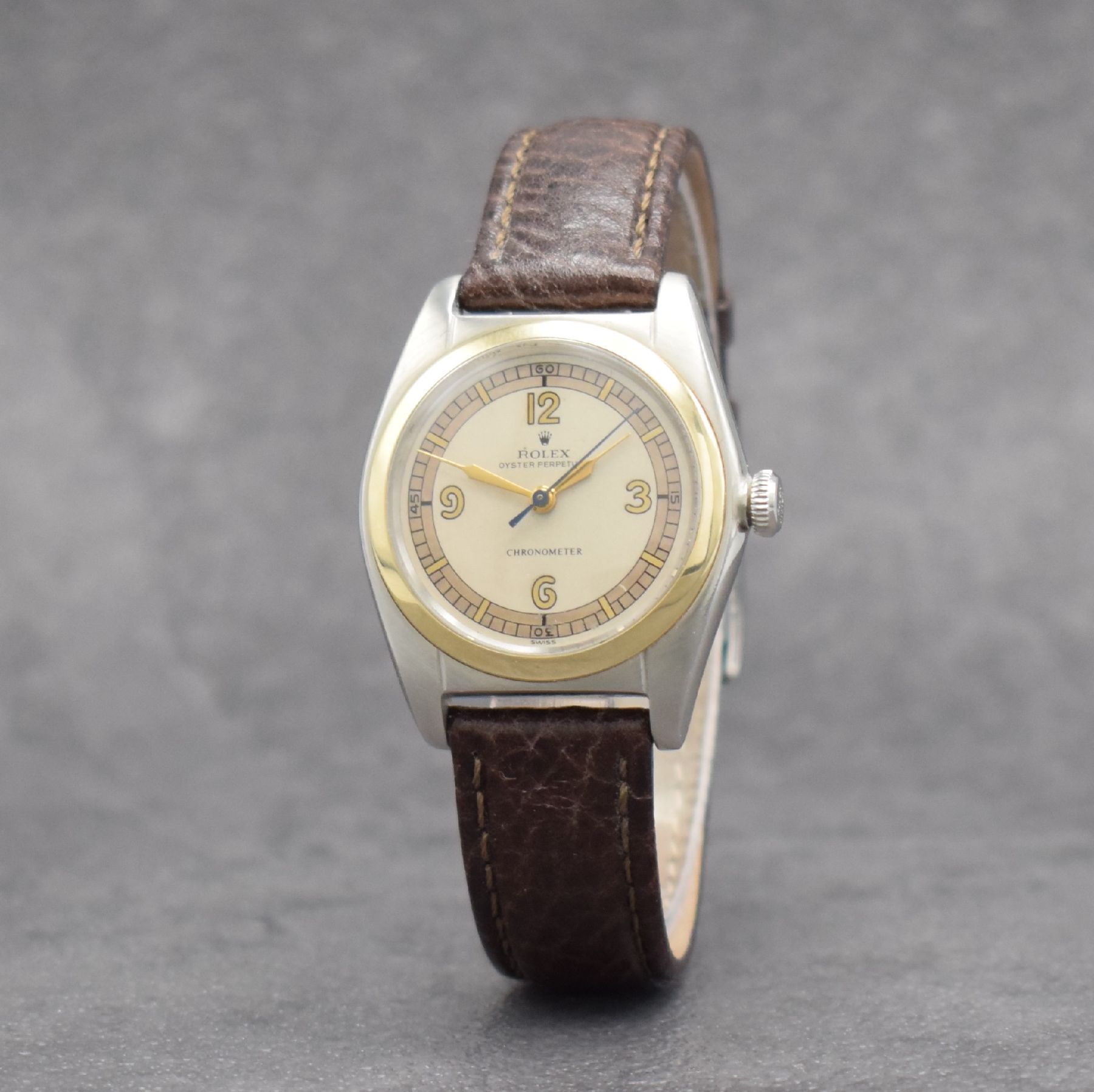 Detail c: ROLEX Chronometer Herrenarmbanduhr Oyster Perpetual Bubble Back in Stahl mit Goldlünette Referenz 4392, Automatik, Schweiz um 1949, Lederband m. ...