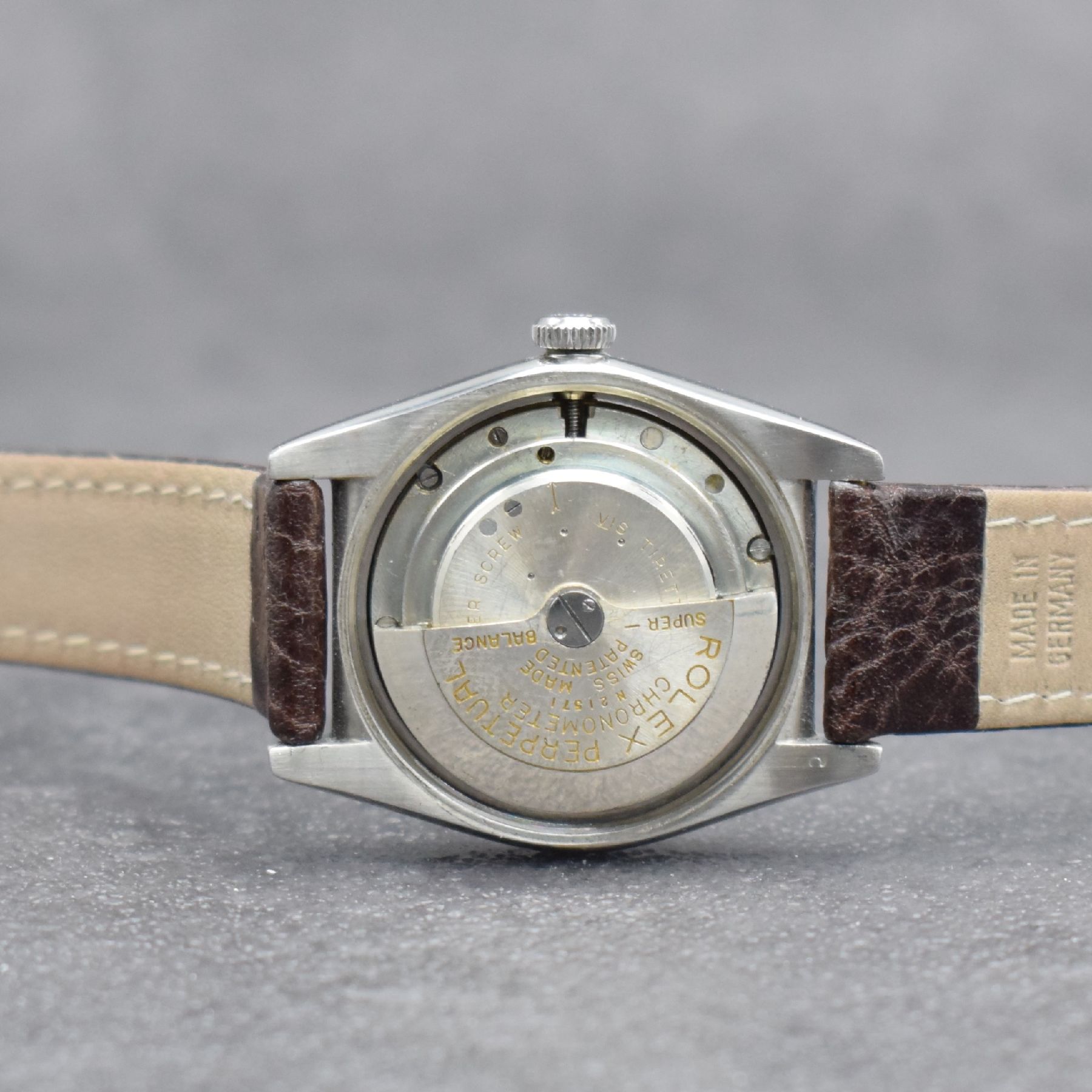 Detail g: ROLEX Chronometer Herrenarmbanduhr Oyster Perpetual Bubble Back in Stahl mit Goldlünette Referenz 4392, Automatik, Schweiz um 1949, Lederband m. ...