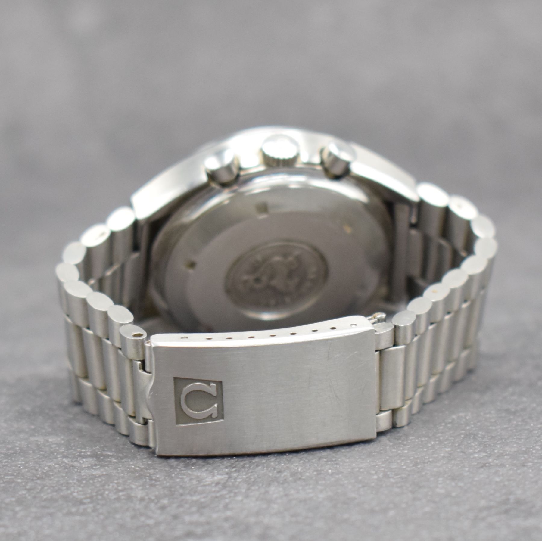 Detail d: OMEGA Speedmaster Herrenarmbanduhr mit Chronograph in Edelstahl, Schweiz um 1980, Automatik, Ref. 176.0012, Boden m. Seamasterlogo geschr., orig. ...