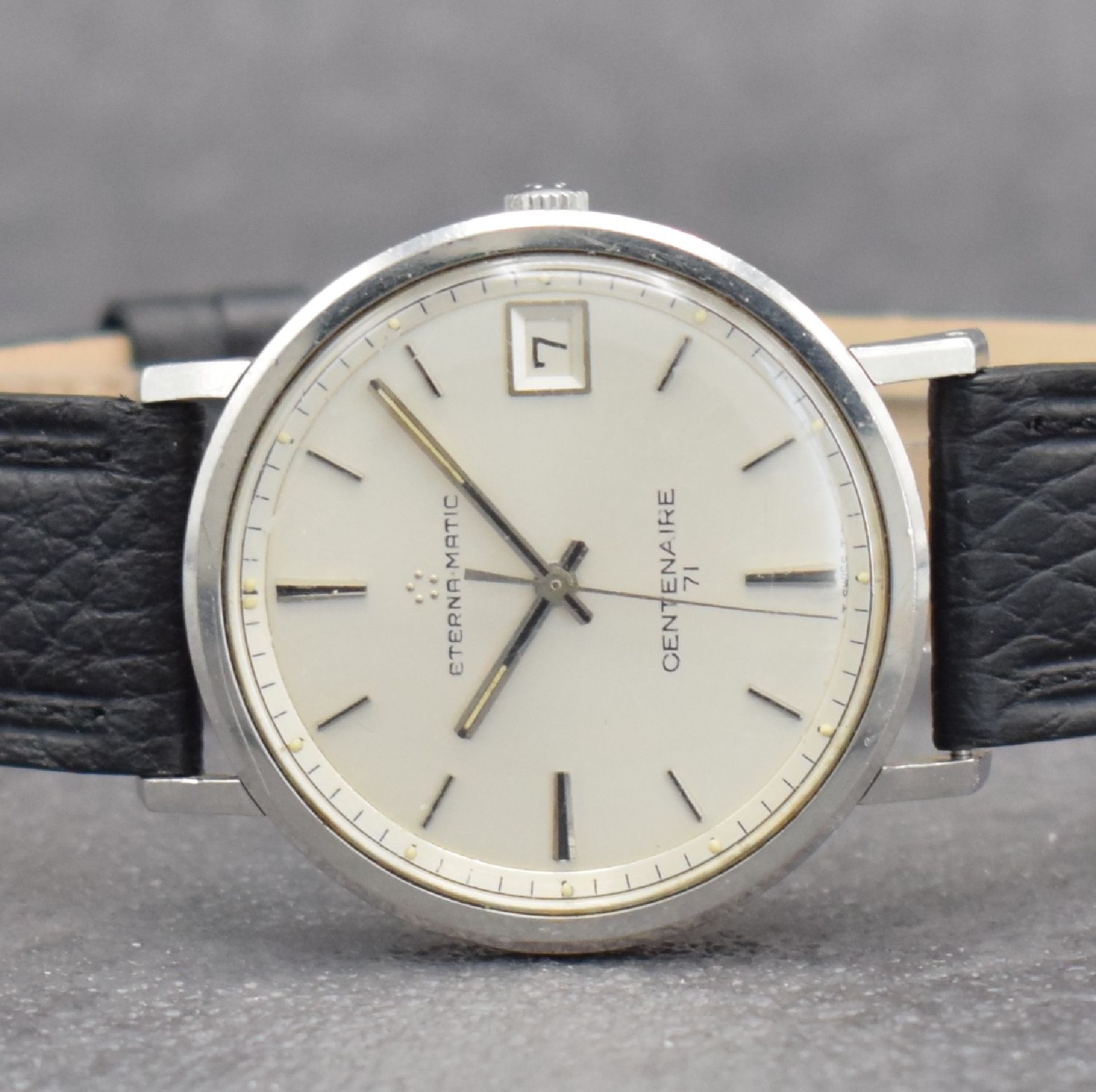 Detail a: ETERNA-MATIC Centenaire 71 Herrenarmbanduhr Referenz 106 IVT, Schweiz 1970er Jahre, Automatik, Edelstahlgeh., Boden geschr., silb. Zifferbl. m. ...