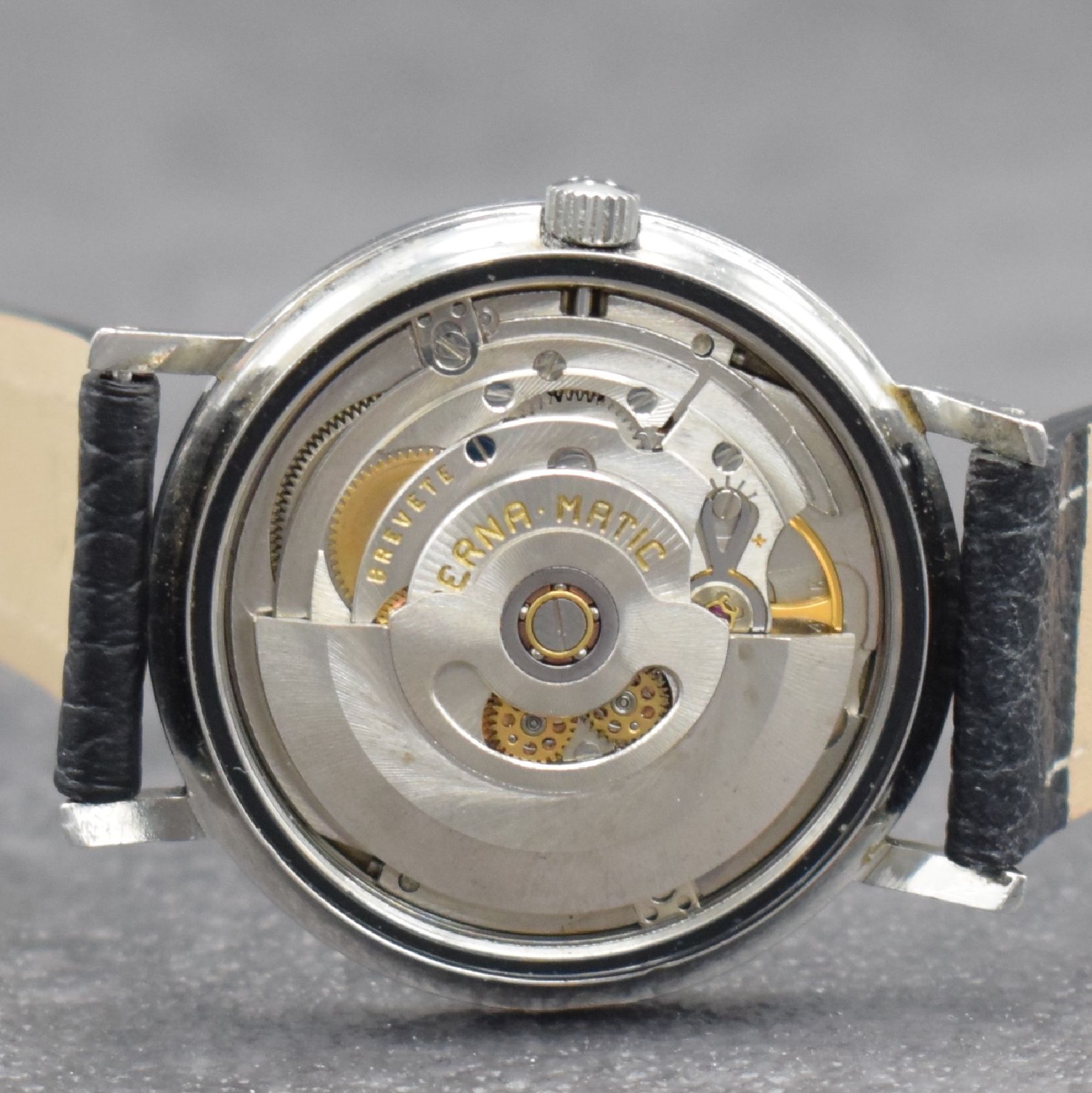 Detail f: ETERNA-MATIC Centenaire 71 Herrenarmbanduhr Referenz 106 IVT, Schweiz 1970er Jahre, Automatik, Edelstahlgeh., Boden geschr., silb. Zifferbl. m. ...