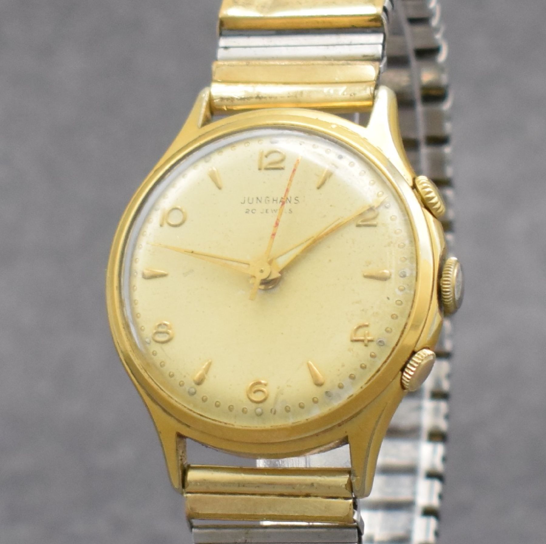 Detail c: JUNGHANS Armbandwecker Kaliber 89, Deutschland um 1960, Handaufzug, verg. Metallgeh. altersbed. ber., 20 St., Geh- & Weckw. 1 Federhaus, ...