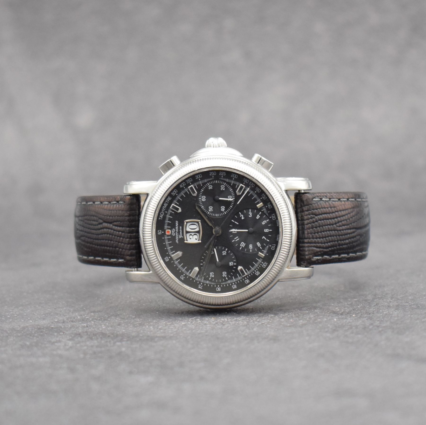 JAQUET GIRARD Armbandchronograph mit Großdatum, Schweiz um 2000, Automatik, beids. vergl. Edelstahlgeh., geriffelte Lünette, Boden 4- fach ...