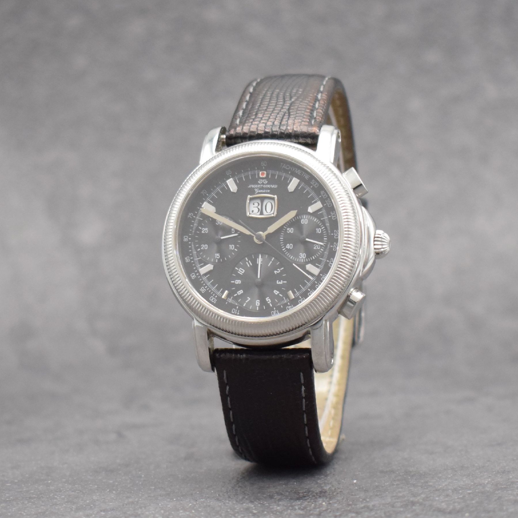 Detail b: JAQUET GIRARD Armbandchronograph mit Großdatum, Schweiz um 2000, Automatik, beids. vergl. Edelstahlgeh., geriffelte Lünette, Boden 4- fach ...